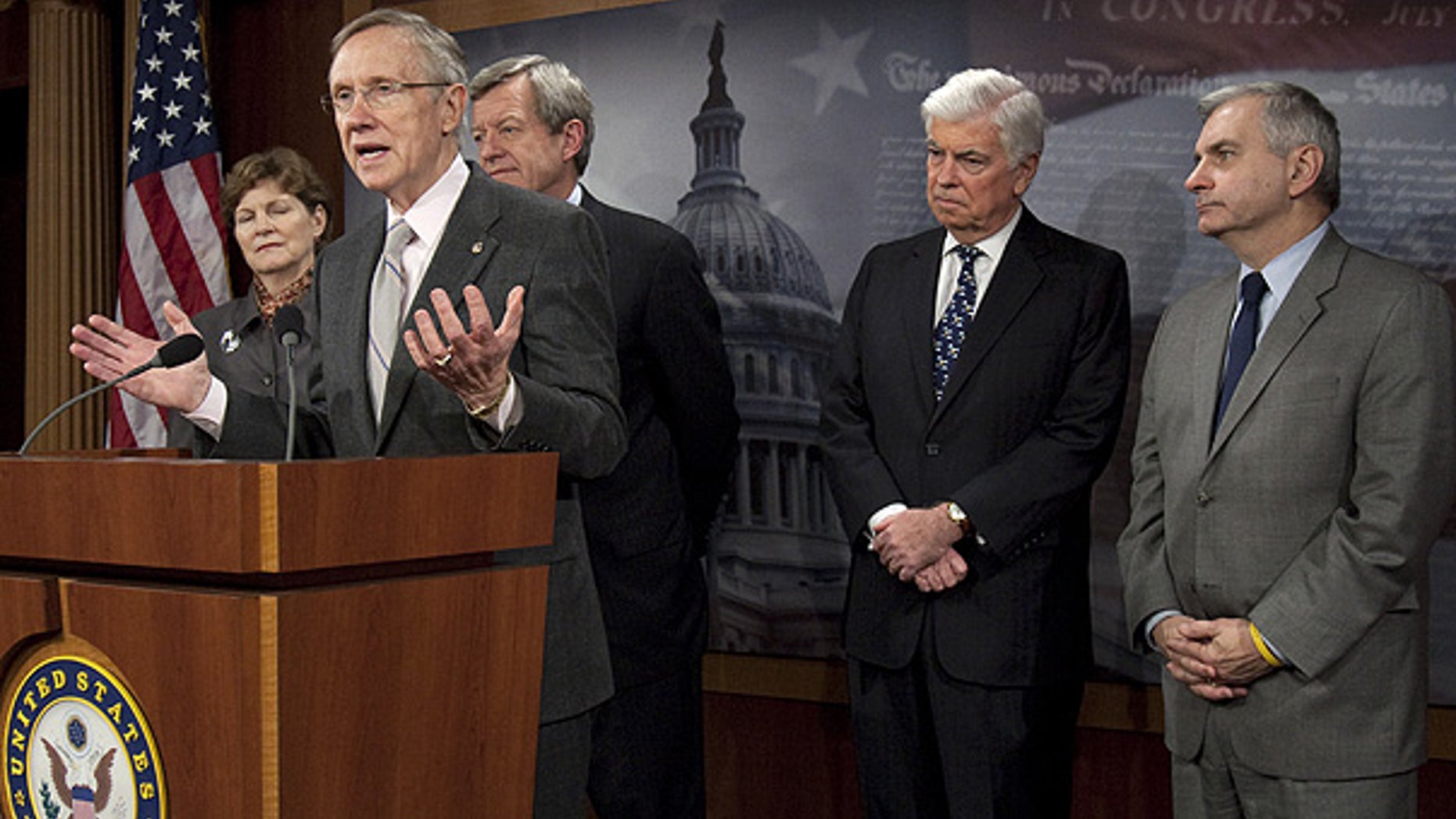 Nov. 4: Senate Majority Leader Harry Reid speaks as Sens. Jeanne Shaheen, Max Baucus, Chris Dodd, and Jack Reed listen on Capitol Hill. (AP)