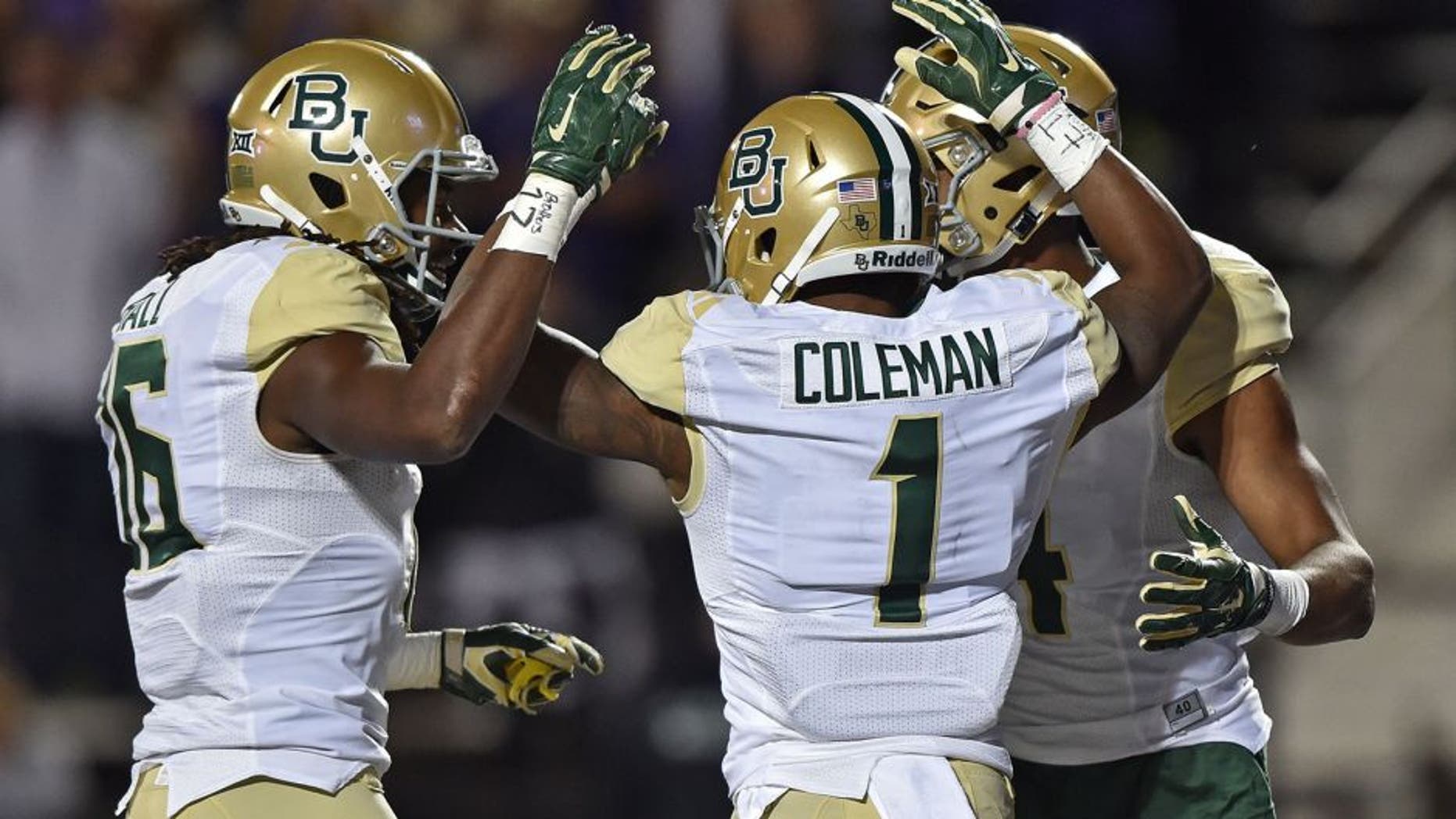 MANHATTAN, KS - NOVEMBER 05: Wide receiver Corey Coleman #1 of the Baylor Bears celebrates with teammates after scoring a touchdown against the Kansas State Wildcats during the first half on November 5, 2015 at Bill Snyder Family Stadium in Manhattan, Kansas. (Photo by Peter G. Aiken/Getty Images)