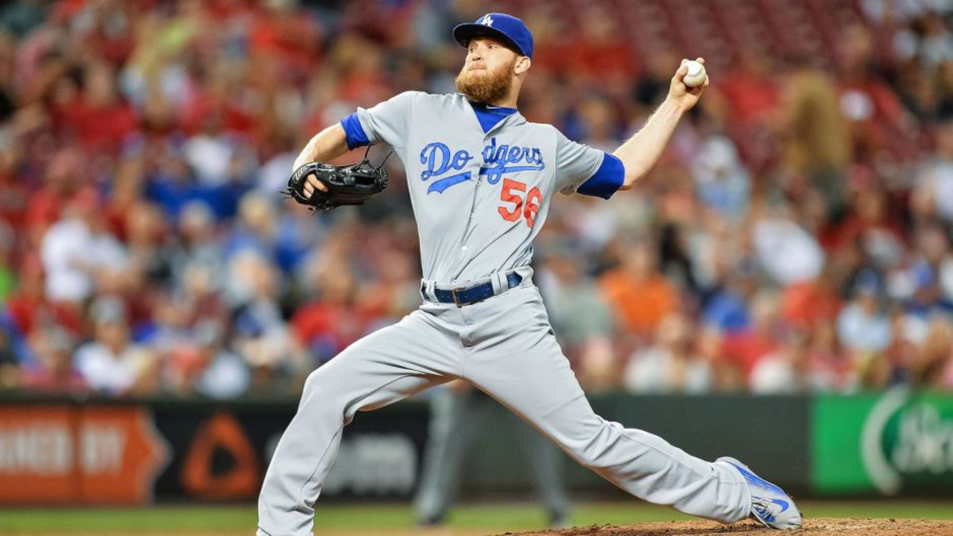 CINCINNATI, OH - AUGUST 25: J.P. Howell #56 of the Los Angeles Dodgers pitches against the Cincinnati Reds at Great American Ball Park on August 25, 2015 in Cincinnati, Ohio. (Photo by Jamie Sabau/Getty Images)