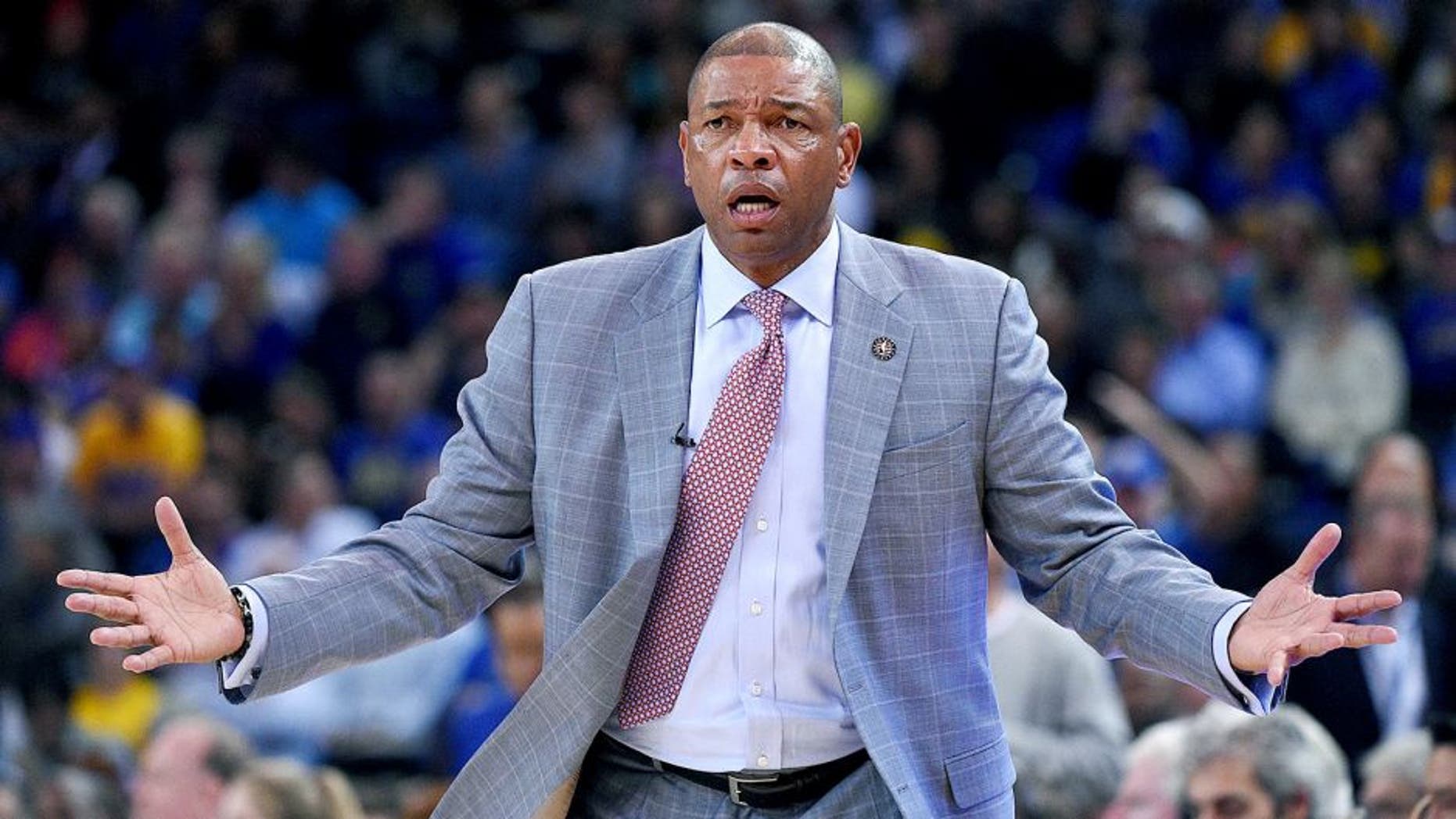 November 5, 2014; Oakland, CA, USA; Los Angeles Clippers head coach Doc Rivers reacts against the Golden State Warriors during the fourth quarter at Oracle Arena. The Warriors defeated the Clippers 121-104. Mandatory Credit: Kyle Terada-USA TODAY Sports