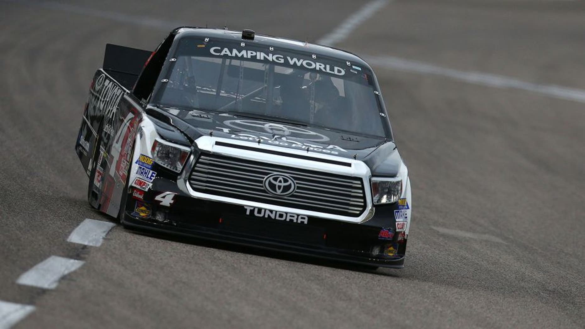 FORT WORTH, TX - NOVEMBER 06: Erik Jones, driver of the #4 Toyota Toyota, drives during Service King qualifying for the NASCAR Camping World Truck Series WinStar World Casino 350 at Texas Motor Speedway on November 6, 2015 in Fort Worth, Texas. (Photo by Sarah Crabill/Getty Images for Texas Motor Speedway)