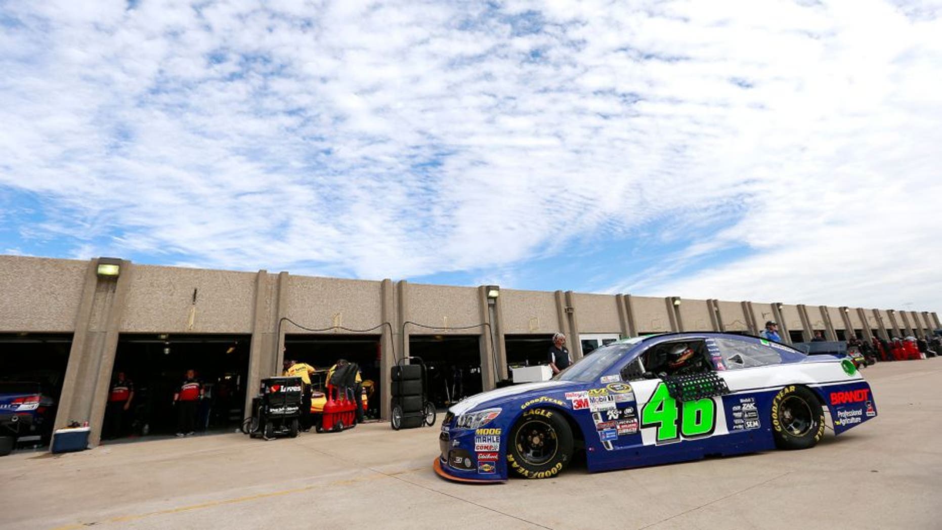 FORT WORTH, TX - NOVEMBER 06: Michael Annett, driver of the #46 Pilot Flying J Chevrolet, drives through the garage area during practice for the NASCAR Sprint Cup Series AAA Texas 500 at Texas Motor Speedway on November 6, 2015 in Fort Worth, Texas. (Photo by Matt Sullivan/NASCAR via Getty Images)
