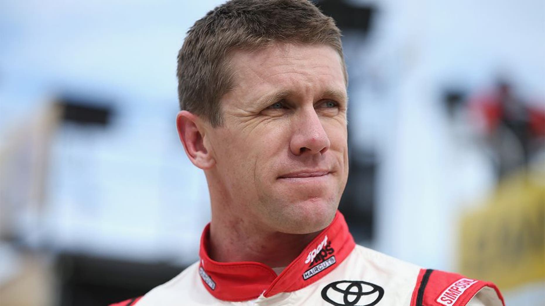 FORT WORTH, TX - NOVEMBER 06: Carl Edwards, driver of the #19 Sport Clips Toyota, stands in the garage area during practice for the NASCAR Sprint Cup Series AAA Texas 500 at Texas Motor Speedway on November 6, 2015 in Fort Worth, Texas. (Photo by Sean Gardner/Getty Images for Texas Motor Speedway)