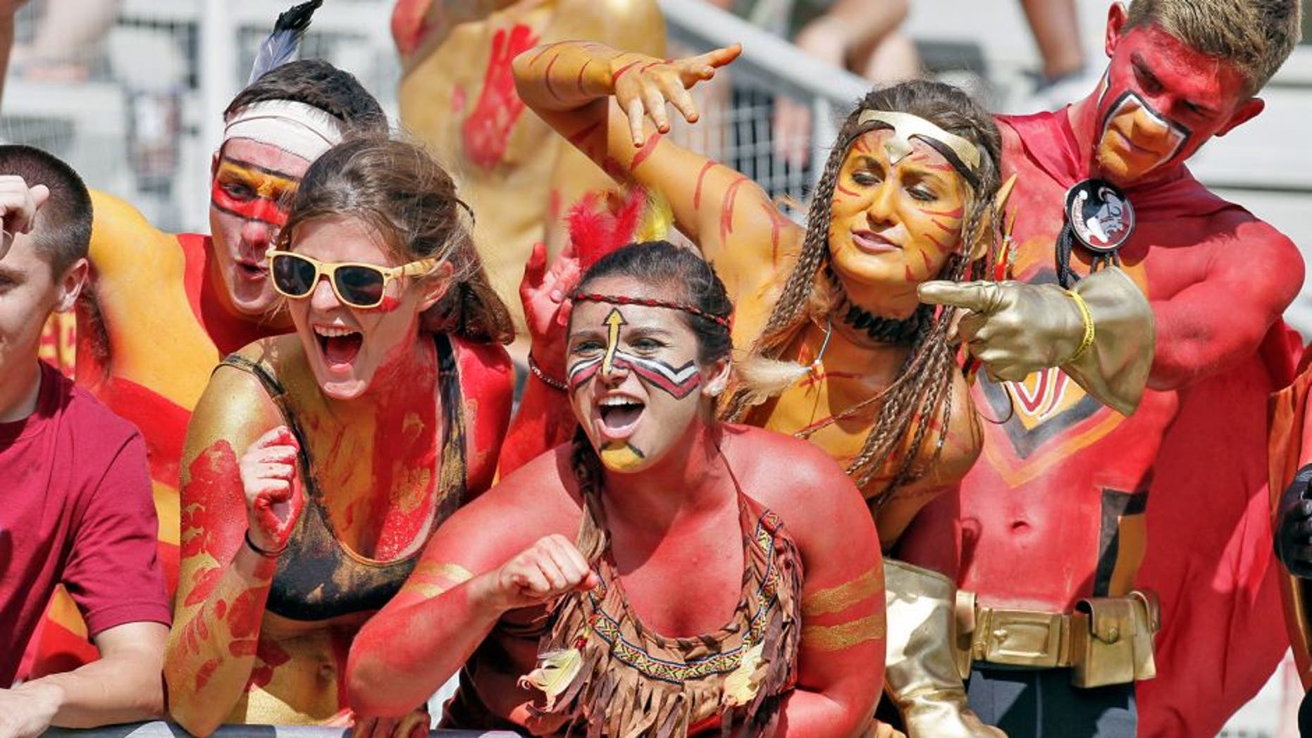 TALLAHASSEE, FL - OCTOBER 5: Florida State fans cheer during the game against the Maryland Terrapins at Doak Campbell Stadium on Bobby Bowden Field on October 5, 2013 in Tallahassee, Florida. The eightth-ranked Florida State Seminoles defeated the 25th-ranked Maryland Terrapins 63-0. (Photo by Don Juan Moore/Getty Images)