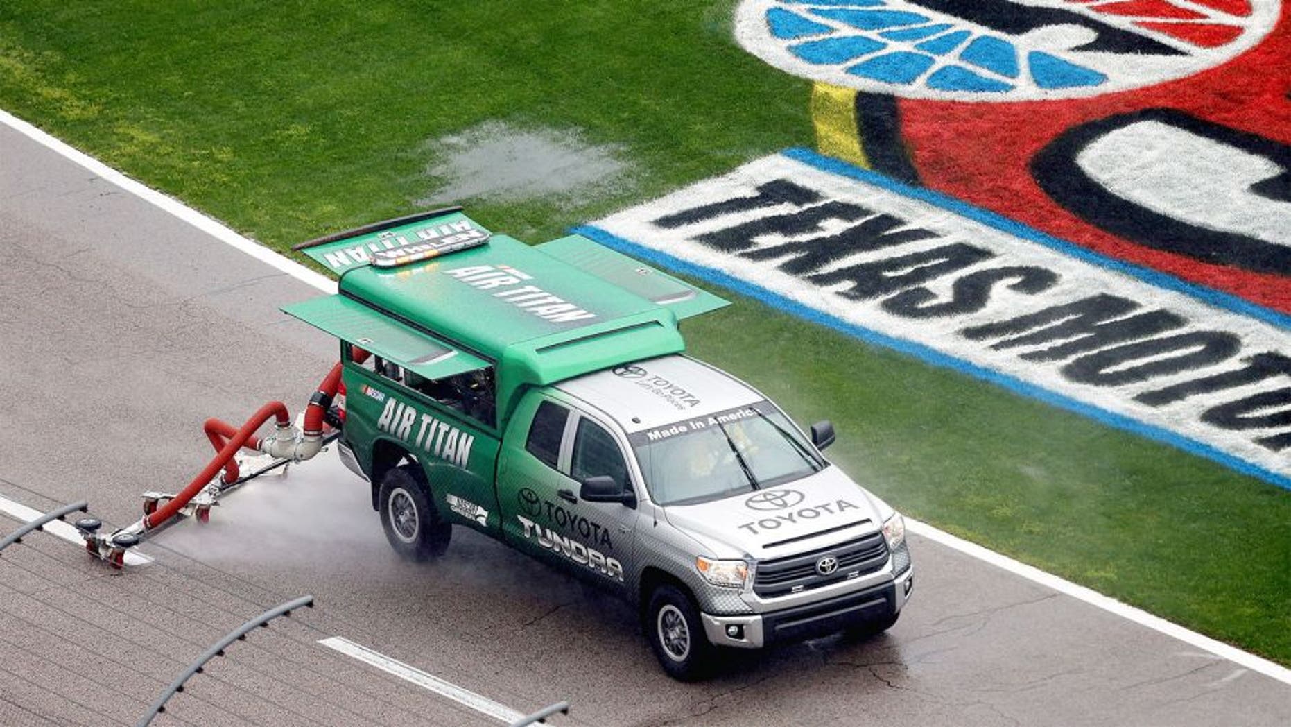 FORT WORTH, TX - APRIL 06: A view of an Air Titan on track as rain falls prior to the NASCAR Sprint Cup Series Duck Commander 500 at Texas Motor Speedway on April 6, 2014 in Fort Worth, Texas. (Photo by Sean Gardner/NASCAR via Getty Images)