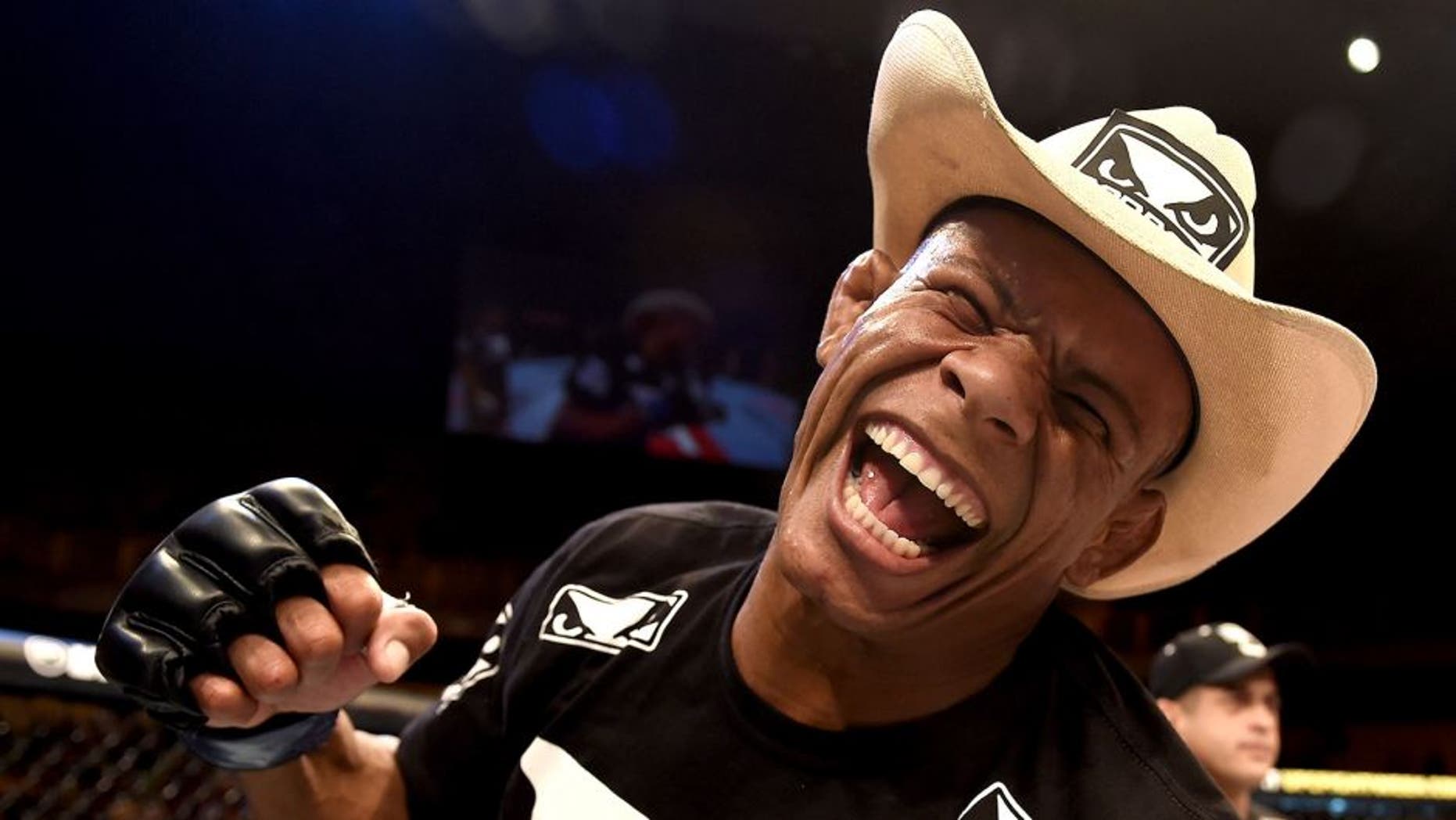 GOIANIA, BRAZIL - MAY 30: Alex Oliveira of Brazil celebrates victory over KJ Noons of the United States in their welterweight UFC bout during the UFC Fight Night event at Arena Goiania on May 30, 2015 in Goiania. (Photo by Buda Mendes/Zuffa LLC/Zuffa LLC via Getty Images)