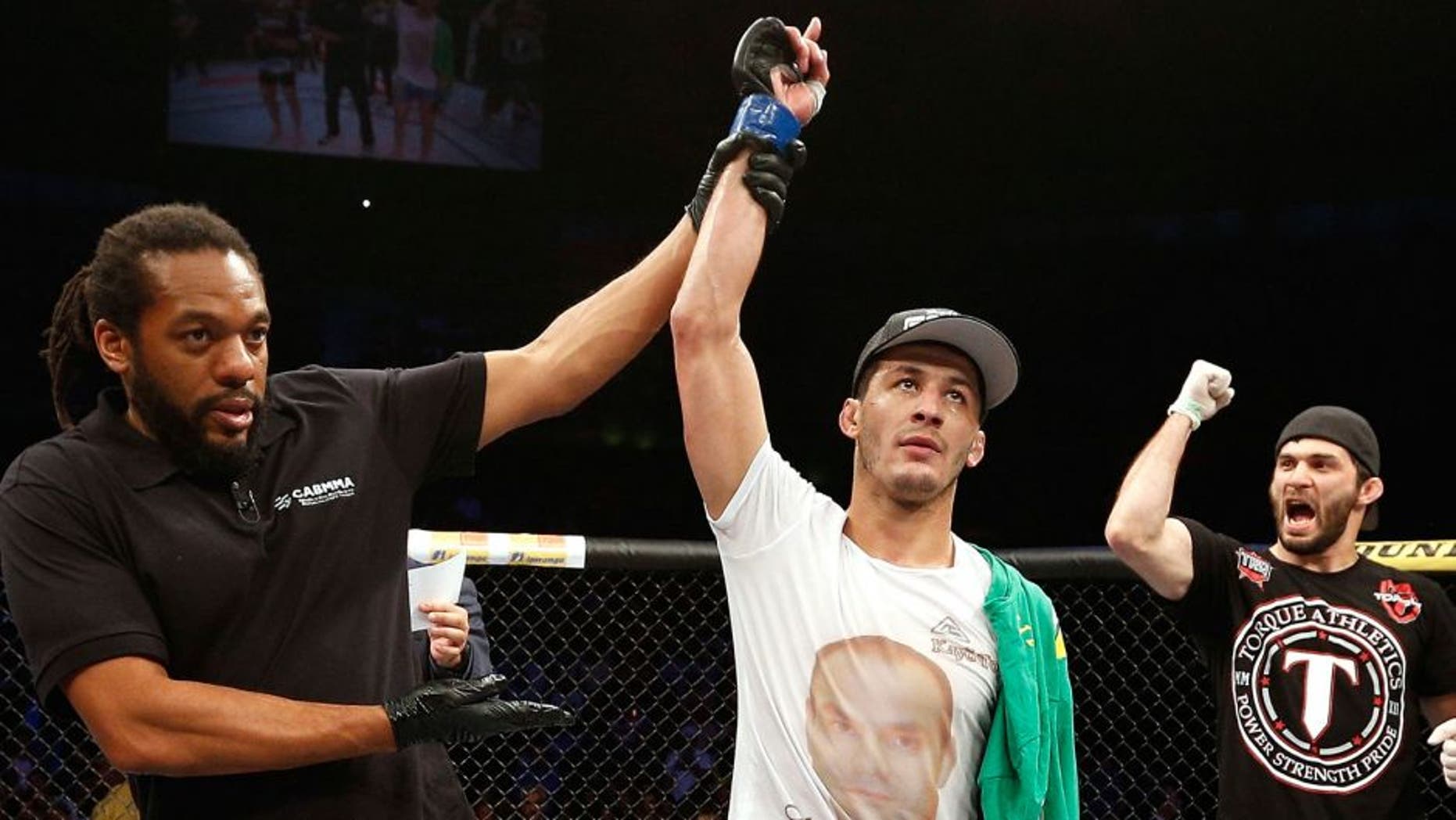 SAO PAULO, BRAZIL - MAY 31: Rashid Magomedov reacts after his decision victory over Rodrigo Damm in their lightweight fight during the UFC Fight Night event at the Ginasio do Ibirapuera on May 31, 2014 in Sao Paulo, Brazil. (Photo by Josh Hedges/Zuffa LLC/Zuffa LLC via Getty Images)
