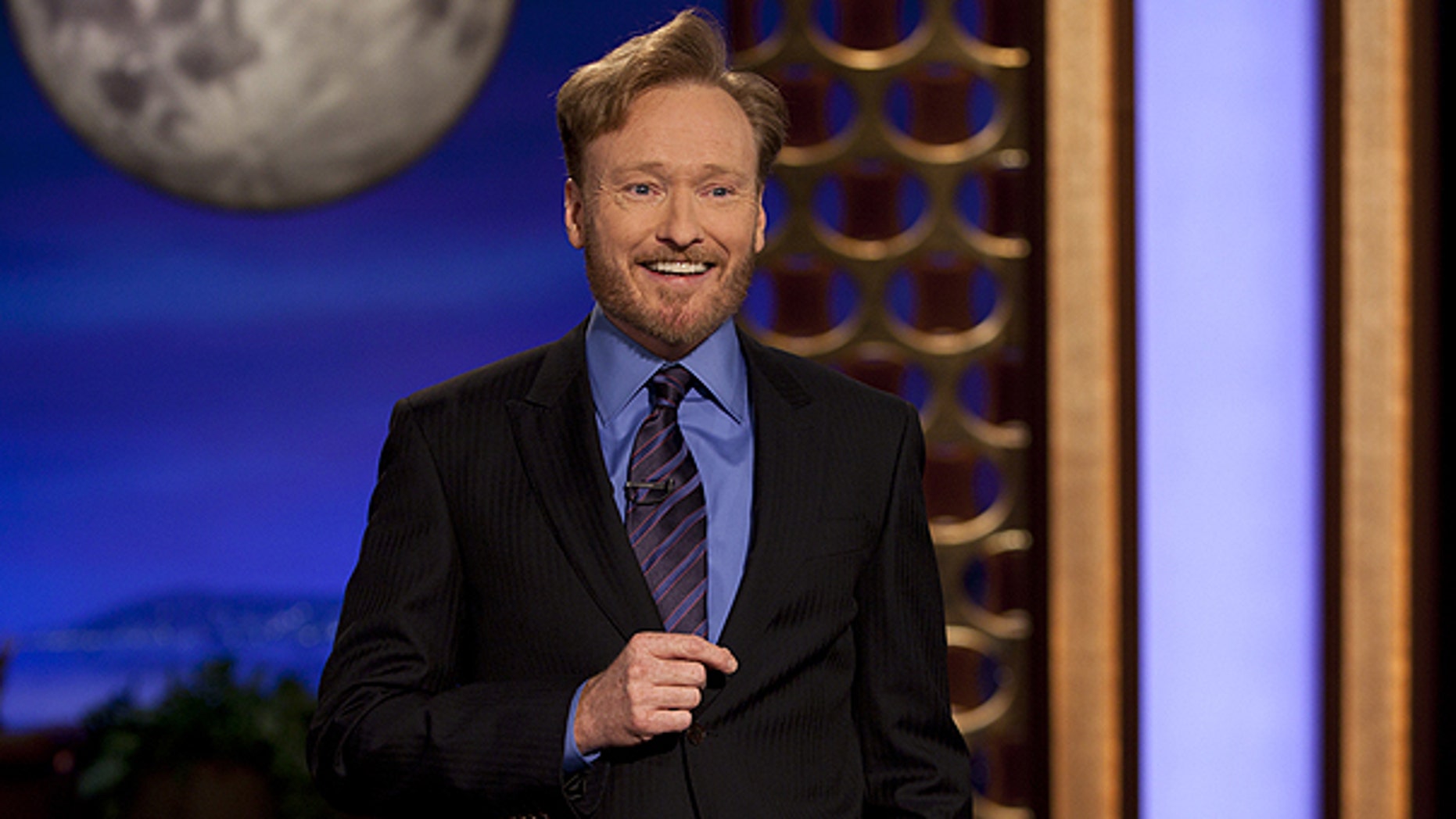 Nov. 8: In this photo provided by TBS, Conan O'Brien performs during the debut of his new TBS show 'Conan.'