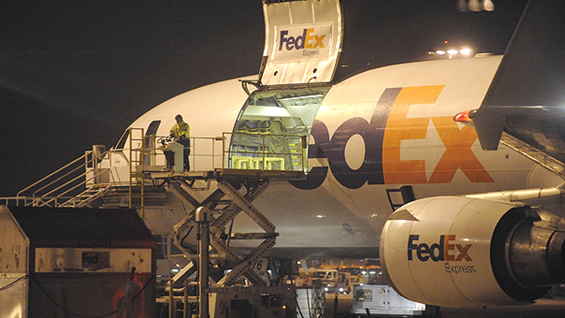 Nov. 1: A cargo plane is loaded at the FedEx distribution center at the International Cargo Airport in Cologne, western Germany.