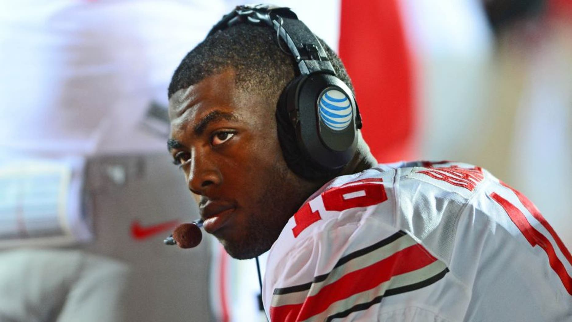 Nov 8, 2014; East Lansing, MI, USA; Ohio State Buckeyes quarterback J.T. Barrett (16) on the bench during the first quarter against the Michigan State Spartans at Spartan Stadium. Mandatory Credit: Andrew Weber-USA TODAY Sports