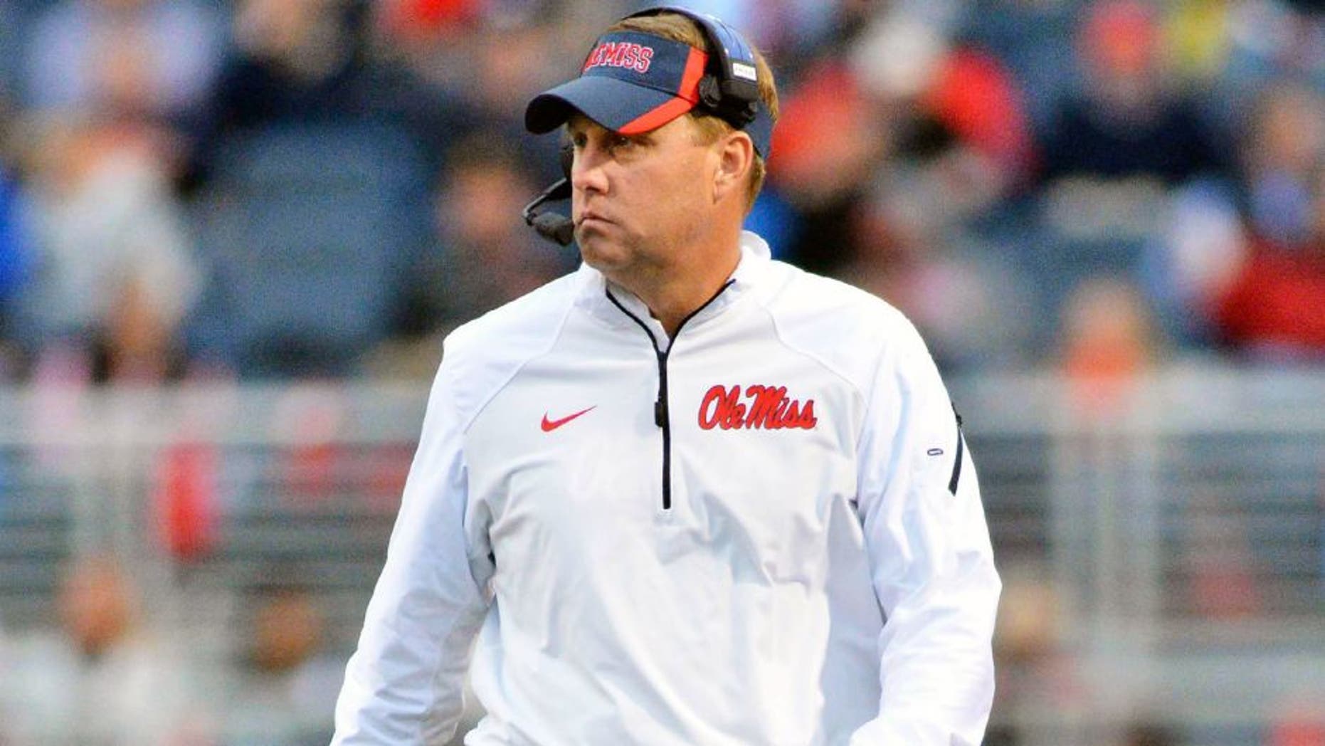 Nov 7, 2015; Oxford, MS, USA; Mississippi Rebels head coach Hugh Freeze walks along the field during a time out during the second quarter of the game against the Arkansas Razorbacks at Vaught-Hemingway Stadium. Mandatory Credit: Matt Bush-USA TODAY Sports