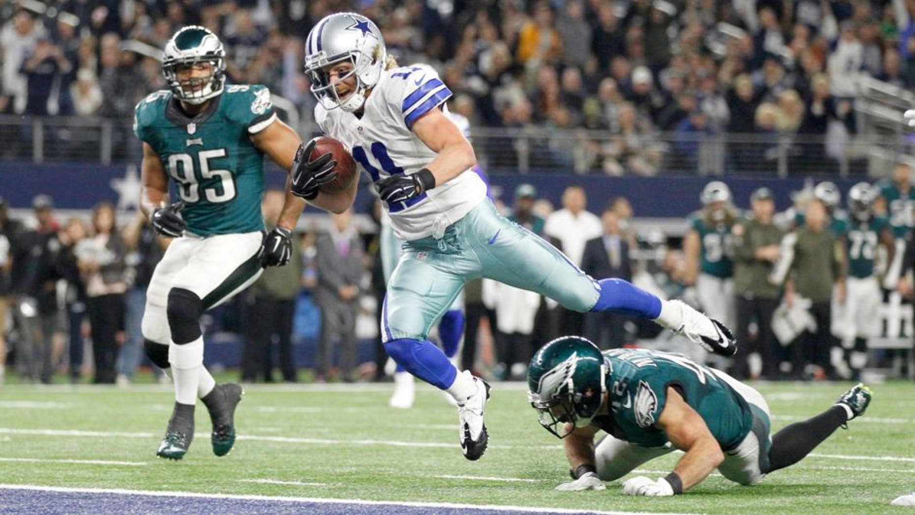Nov 8, 2015; Arlington, TX, USA; Dallas Cowboys wide receiver Cole Beasley (11) scores a touchdown against Philadelphia Eagles free safety Chris Maragos (42) in the third quarter at AT&T Stadium. Mandatory Credit: Tim Heitman-USA TODAY Sports