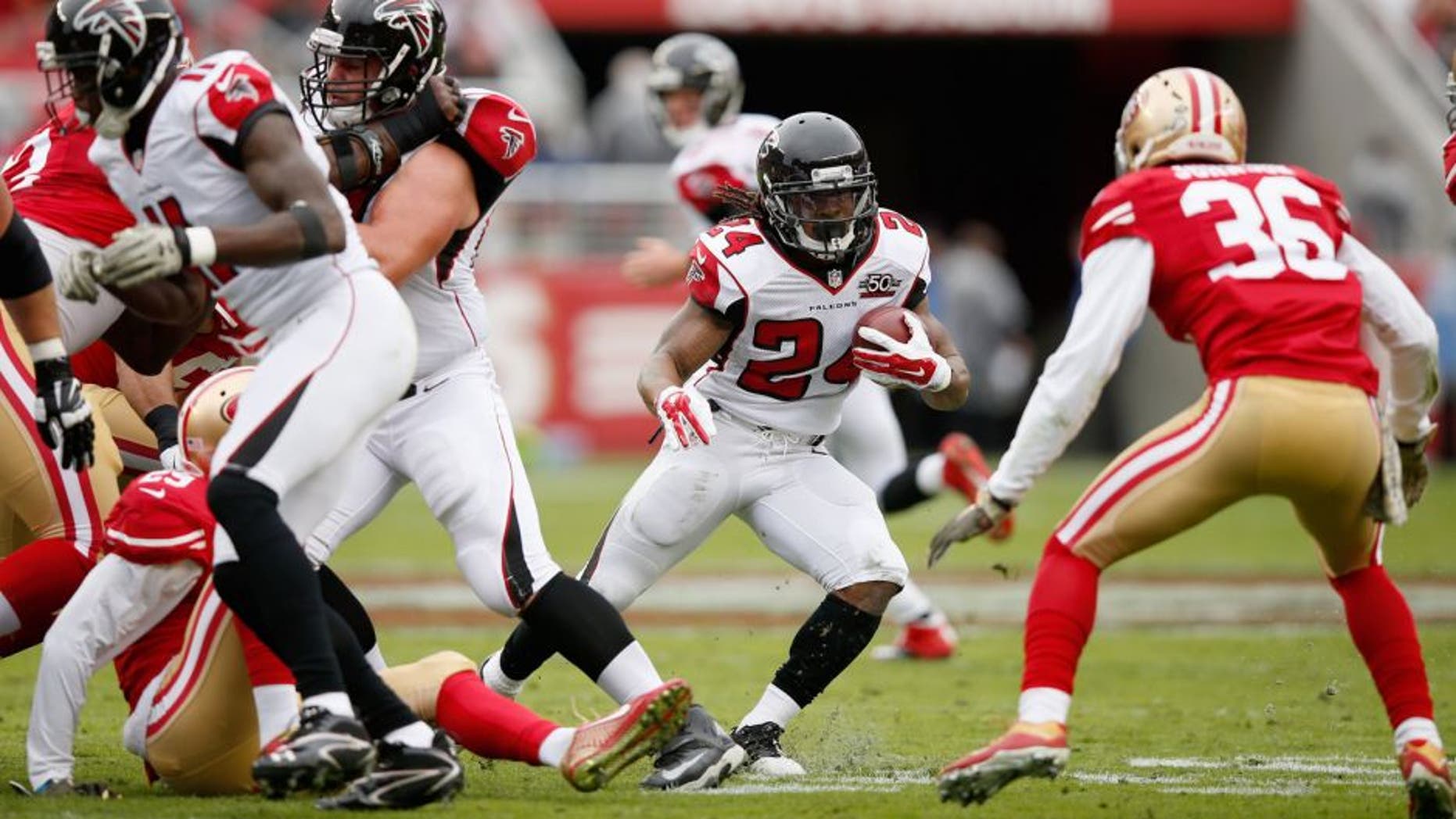 SANTA CLARA, CA - NOVEMBER 08: Devonta Freeman #24 of the Atlanta Falcons runs with the ball against the San Francisco 49ers at Levi's Stadium on November 8, 2015 in Santa Clara, California. (Photo by Ezra Shaw/Getty Images)