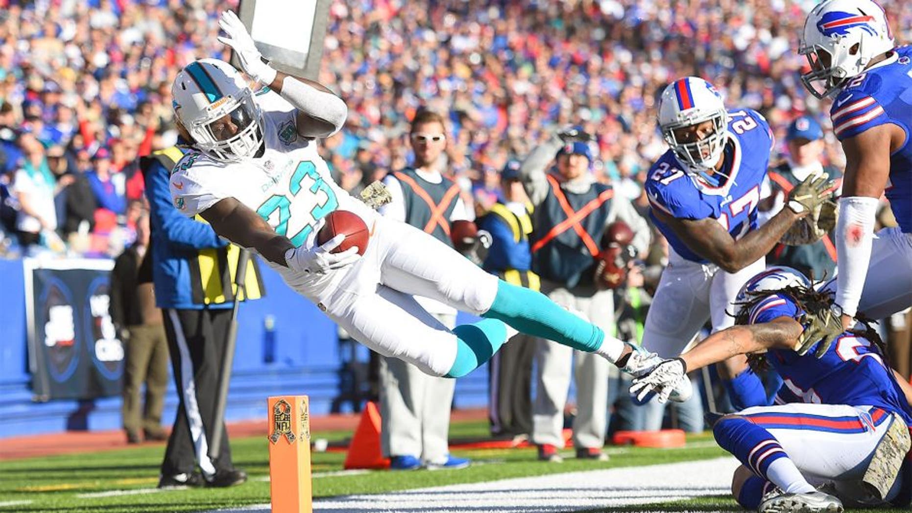 ORCHARD PARK, NY - NOVEMBER 08: Jay Ajayi #23 of the Miami Dolphins comes up short of a touchdown against the Buffalo Bills during the second half at Ralph Wilson Stadium on November 8, 2015 in Orchard Park, New York. (Photo by Rich Barnes/Getty Images)