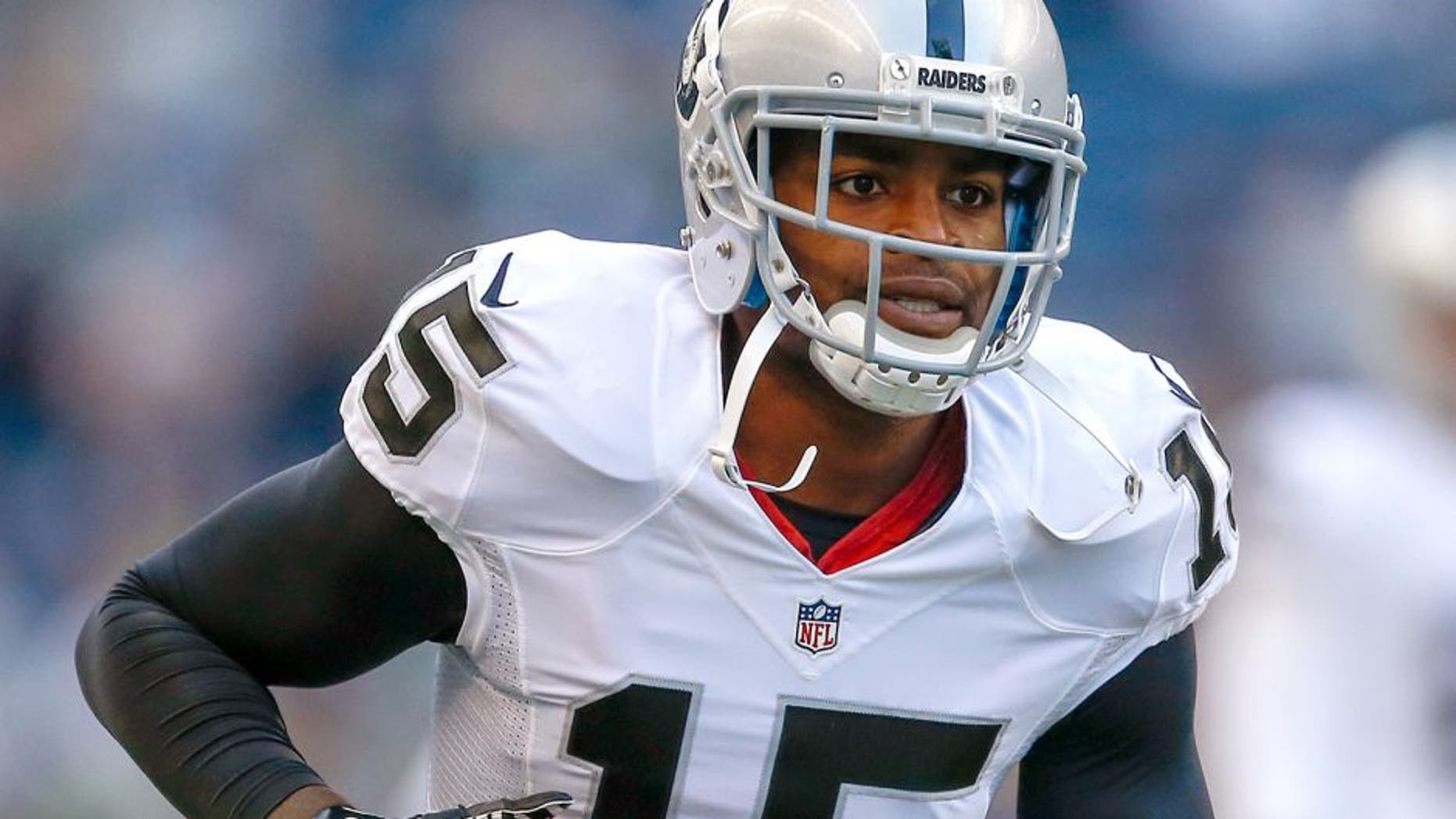 SEATTLE, WA - SEPTEMBER 03: Wide receiver Michael Crabtree #15 of the Oakland Raiders warms up prior to the game against the Seattle Seahawks at CenturyLink Field on September 3, 2015 in Seattle, Washington. (Photo by Otto Greule Jr/Getty Images)