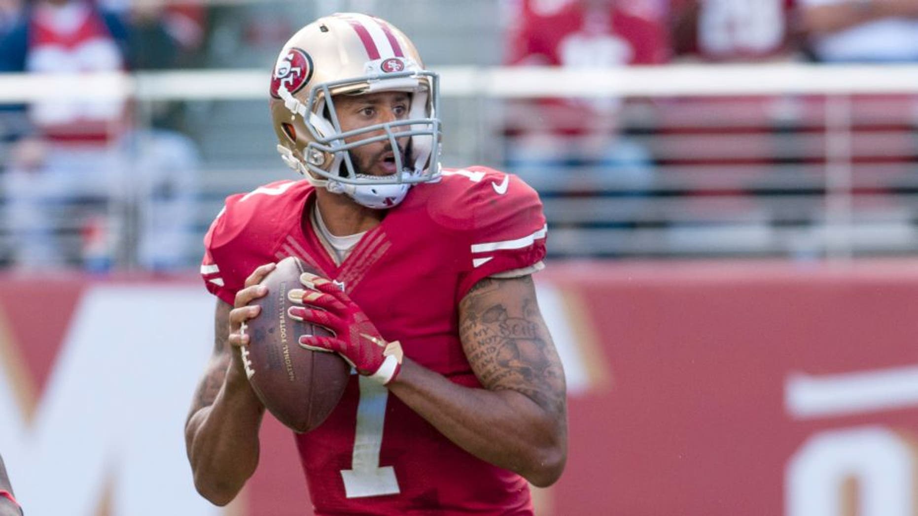 Oct 18, 2015; Santa Clara, CA, USA; San Francisco 49ers quarterback Colin Kaepernick (7) throws a pass against the Baltimore Ravens during the second quarter at Levi's Stadium. Mandatory Credit: Ed Szczepanski-USA TODAY Sports