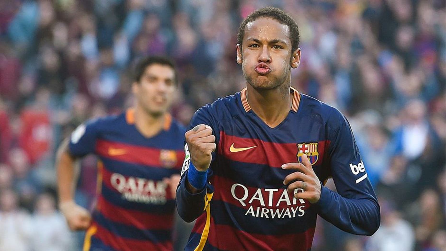 Barcelona's Brazilian forward Neymar da Silva Santos Junior celebrates his goal during the Spanish league football match FC Barcelona vs Villarreal CF at the Camp Nou stadium in Barcelona on November 8, 2015. AFP PHOTO/ JOSEP LAGO (Photo credit should read JOSEP LAGO/AFP/Getty Images)