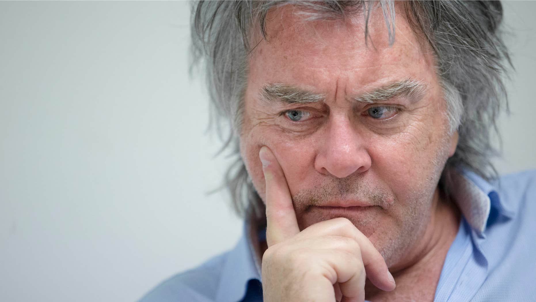 FILE – In this Feb. 19, 2016, file photo, Hillsboro, Ohio, Mayor Drew Hastings, who is a veteran standup comedian, pauses during an interview at his office in Hillsboro, Ohio.