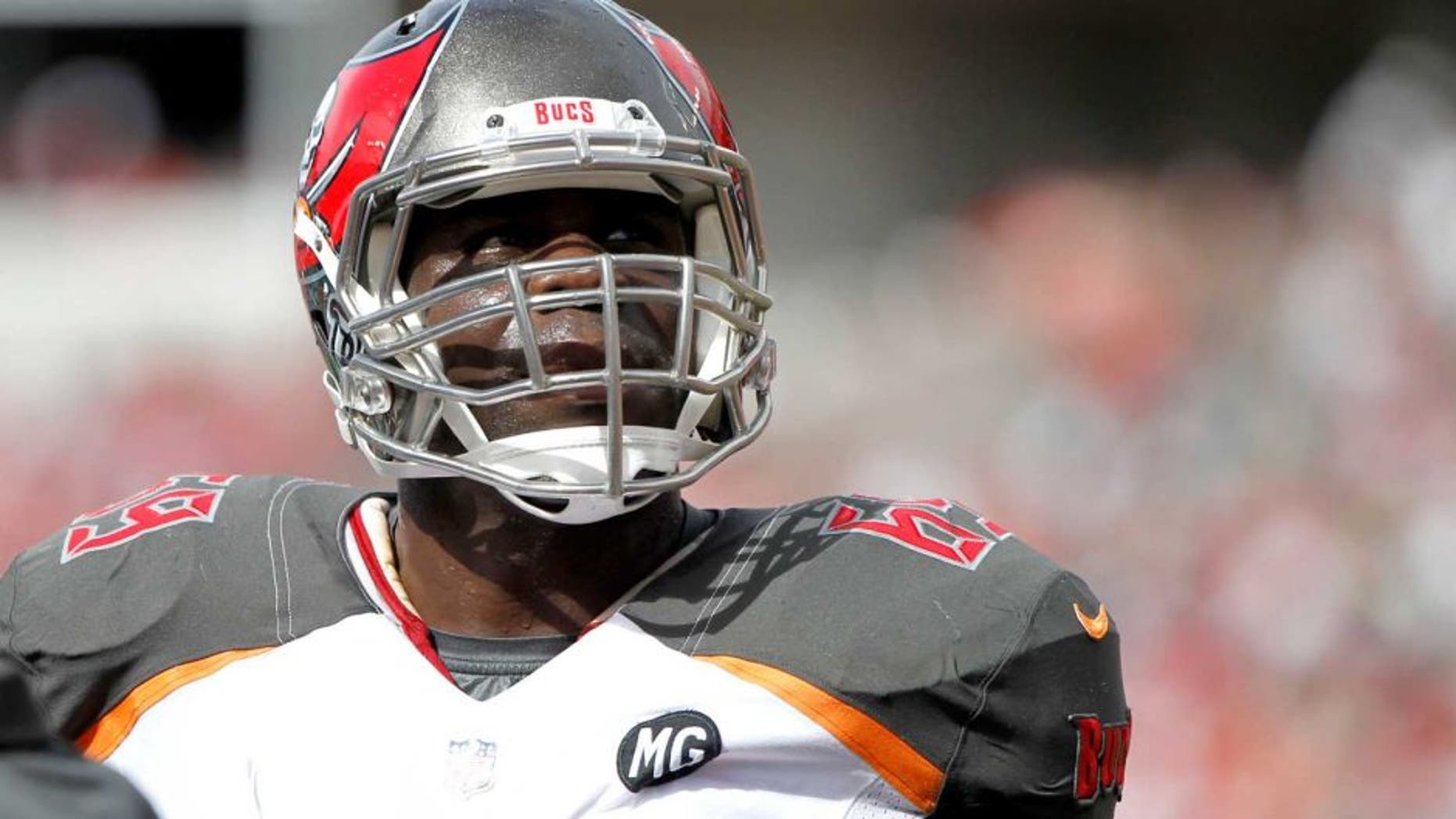 Sep 7, 2014; Tampa, FL, USA; Tampa Bay Buccaneers tackle Demar Dotson (69) during the first half against the Carolina Panthers at Raymond James Stadium. Mandatory Credit: Kim Klement-USA TODAY Sports