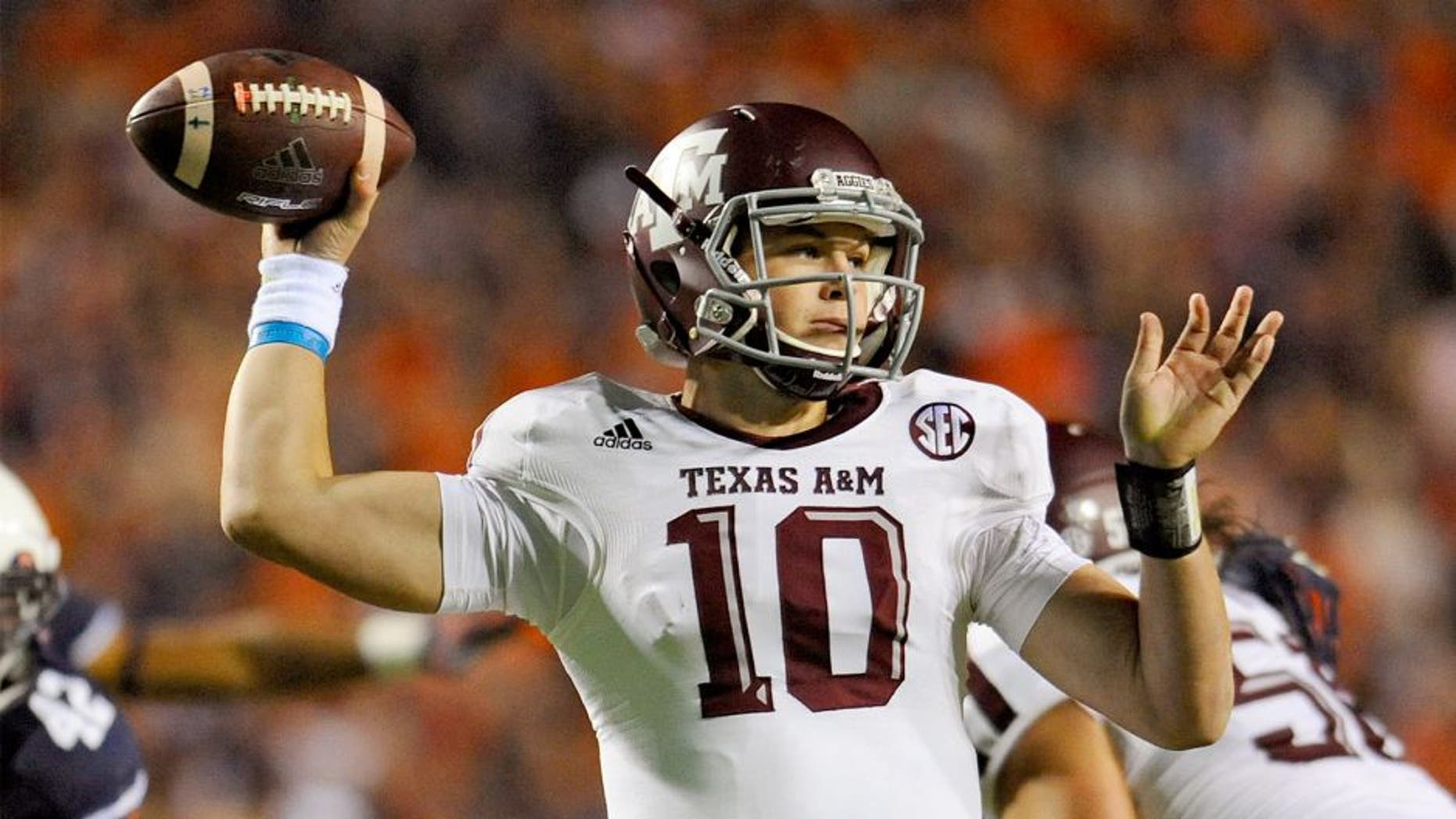 Nov 8, 2014; Auburn, AL, USA; Texas A&M Aggies quarterback Kyle Allen (10) looks to pass against the Auburn Tigers at Jordan Hare Stadium. Texas A&M won 41-38. Mandatory Credit: Shanna Lockwood-USA TODAY Sports