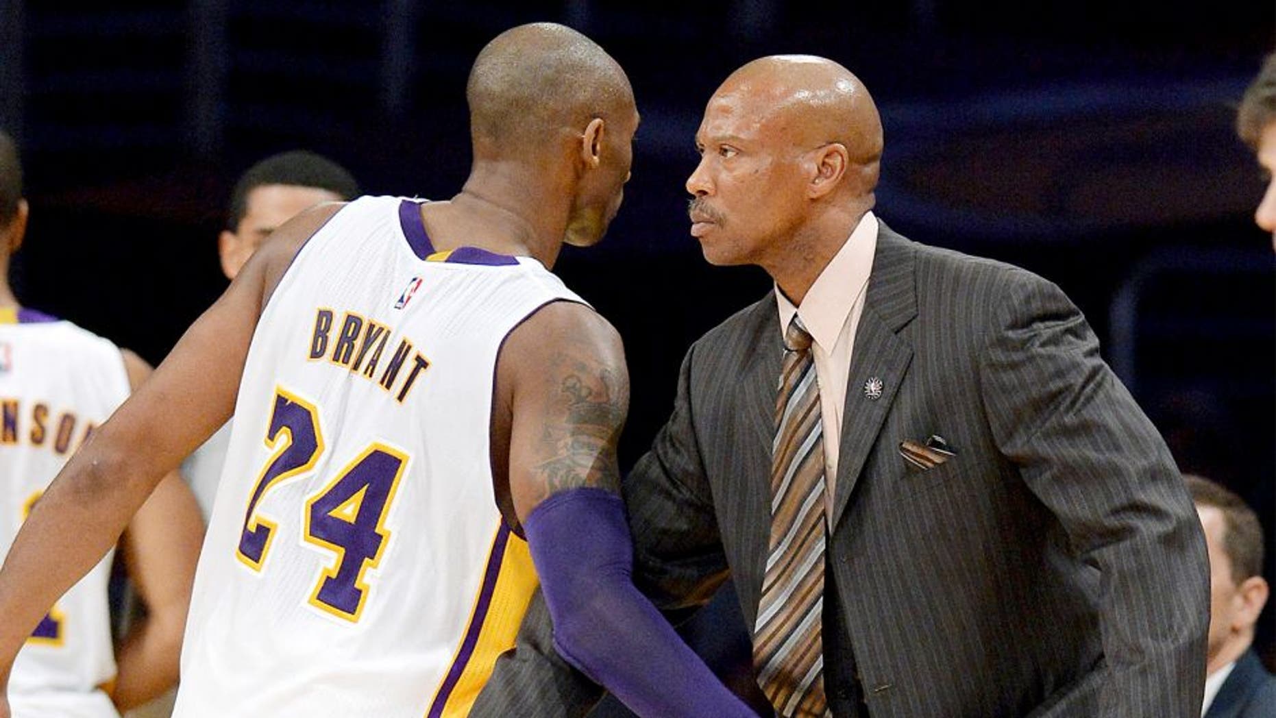 Nov 9, 2014; Los Angeles, CA, USA; Los Angeles Lakers guard Kobe Bryant (24) and head coach Byron Scott in the second half of the game against the Charlotte Hornets at Staples Center. Lakers won 107-92. Mandatory Credit: Jayne Kamin-Oncea-USA TODAY Sports