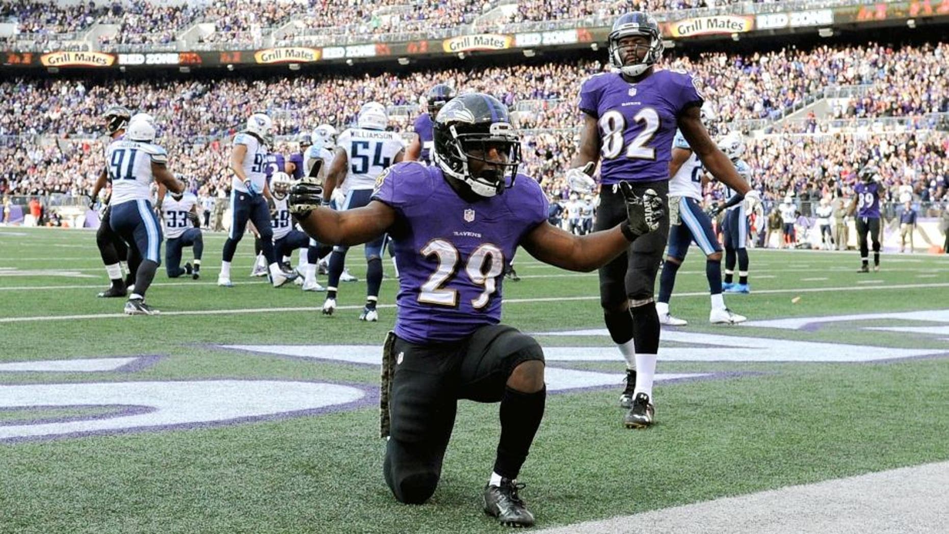 BALTIMORE, MD - NOVEMBER 09: Running back Justin Forsett #29 of the Baltimore Ravens celebrates after scoring a third quarter touchdown against the Tennessee Titans at M&T Bank Stadium on November 9, 2014 in Baltimore, Maryland. (Photo by Patrick Smith/Getty Images)