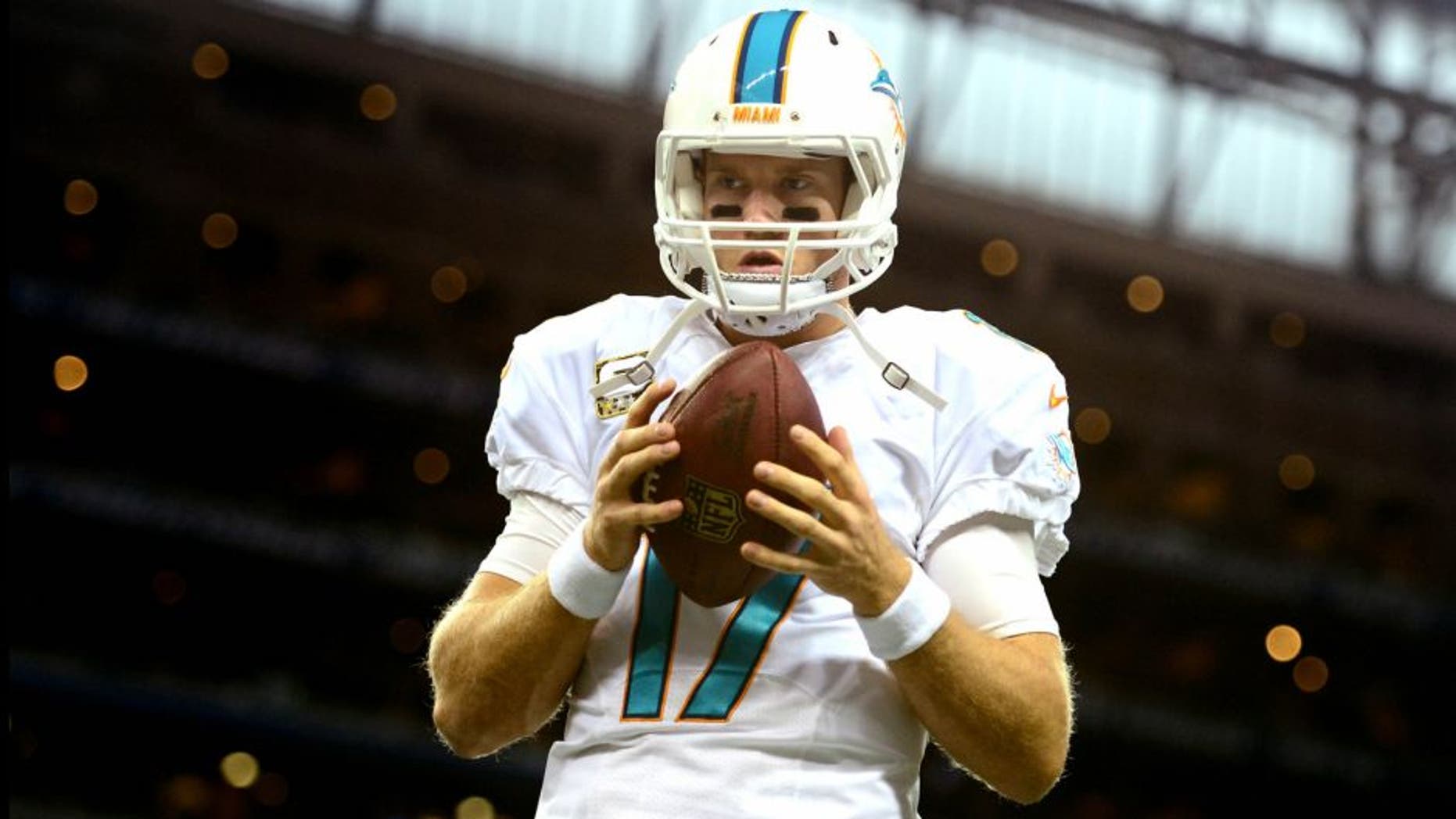 Nov 9, 2014; Detroit, MI, USA; Miami Dolphins quarterback Ryan Tannehill (17) warms up prior to the game against the Detroit Lions at Ford Field. Mandatory Credit: Andrew Weber-USA TODAY Sports