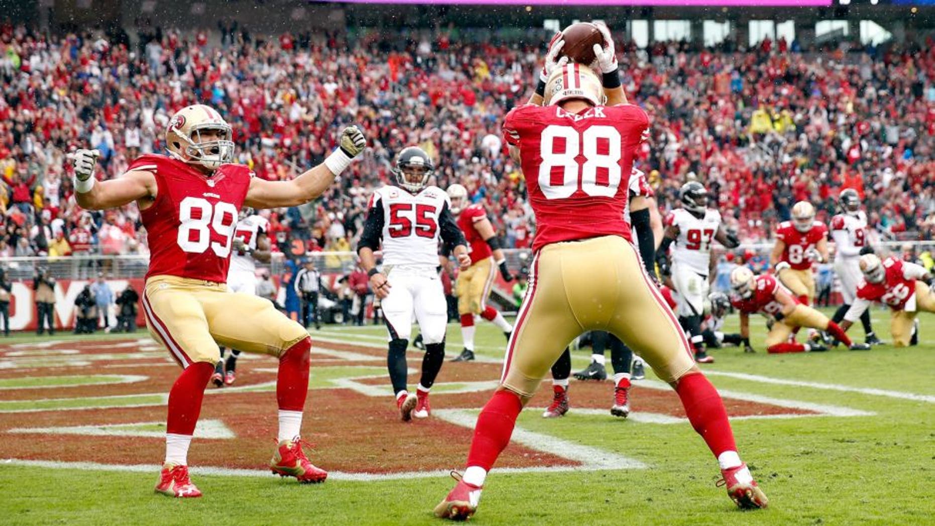 SANTA CLARA, CA - NOVEMBER 08: Vance McDonald #89 celebrates with Garrett Celek #88 of the San Francisco 49ers after Celek made a touchdown against the Atlanta Falcons at Levi's Stadium on November 8, 2015 in Santa Clara, California. (Photo by Ezra Shaw/Getty Images)