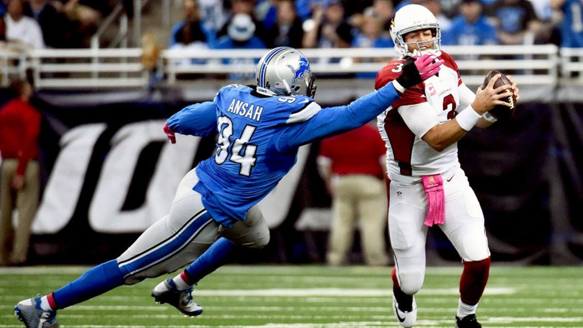 Oct 11, 2015; Detroit, MI, USA; Detroit Lions defensive end Ezekiel Ansah (94) sacks Arizona Cardinals quarterback Carson Palmer (3) during the first quarter at Ford Field. Mandatory Credit: Tim Fuller-USA TODAY Sports