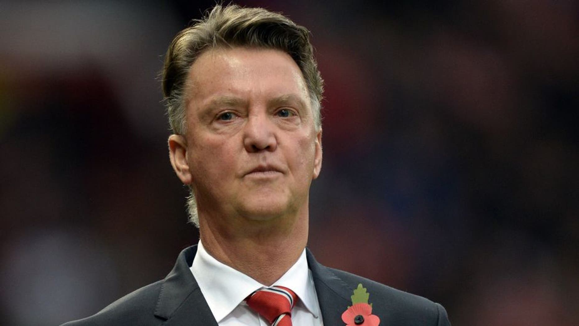 Manchester United's Dutch manager Louis van Gaal leaves the pitch at half-time during the English Premier League football match between Manchester United and West Bromwich Albion at Old Trafford stadium in Manchester, north west England, on November 7, 2015. AFP PHOTO / OLI SCARFF RESTRICTED TO EDITORIAL USE. No use with unauthorized audio, video, data, fixture lists, club/league logos or 'live' services. Online in-match use limited to 75 images, no video emulation. No use in betting, games or single club/league/player publications. (Photo credit should read OLI SCARFF/AFP/Getty Images)