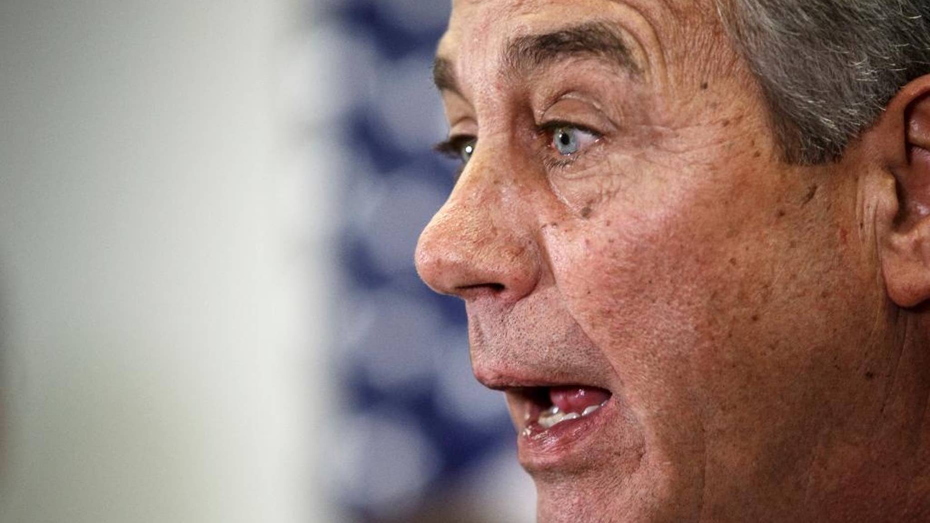 House Speaker John Boehner of Ohio says Senate Democrats should "get off their ass" and pass a bill to fund the Homeland Security Department and restrict President Barack Obama's executive moves on immigration, Wednesday, Feb. 11, 2015, during a news conference following a GOP strategy meeting, on Capitol Hill in Washington. His comments Wednesday underscored a worsening stalemate on Capitol Hill with funding for the Homeland Security Department set to expire Feb. 27. A day earlier, Senate Majority Leader Mitch McConnell declared the Senate "stuck" on the issue and said the next move was in the House's court. (AP Photo/J. Scott Applewhite)