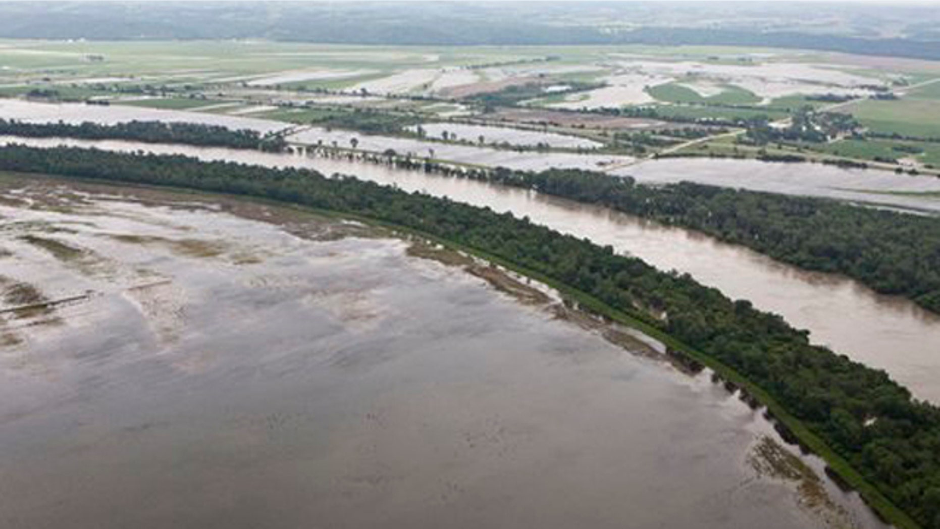 FILE - In this photo the Missouri River floods farmland north of Hamburg, Iowa.