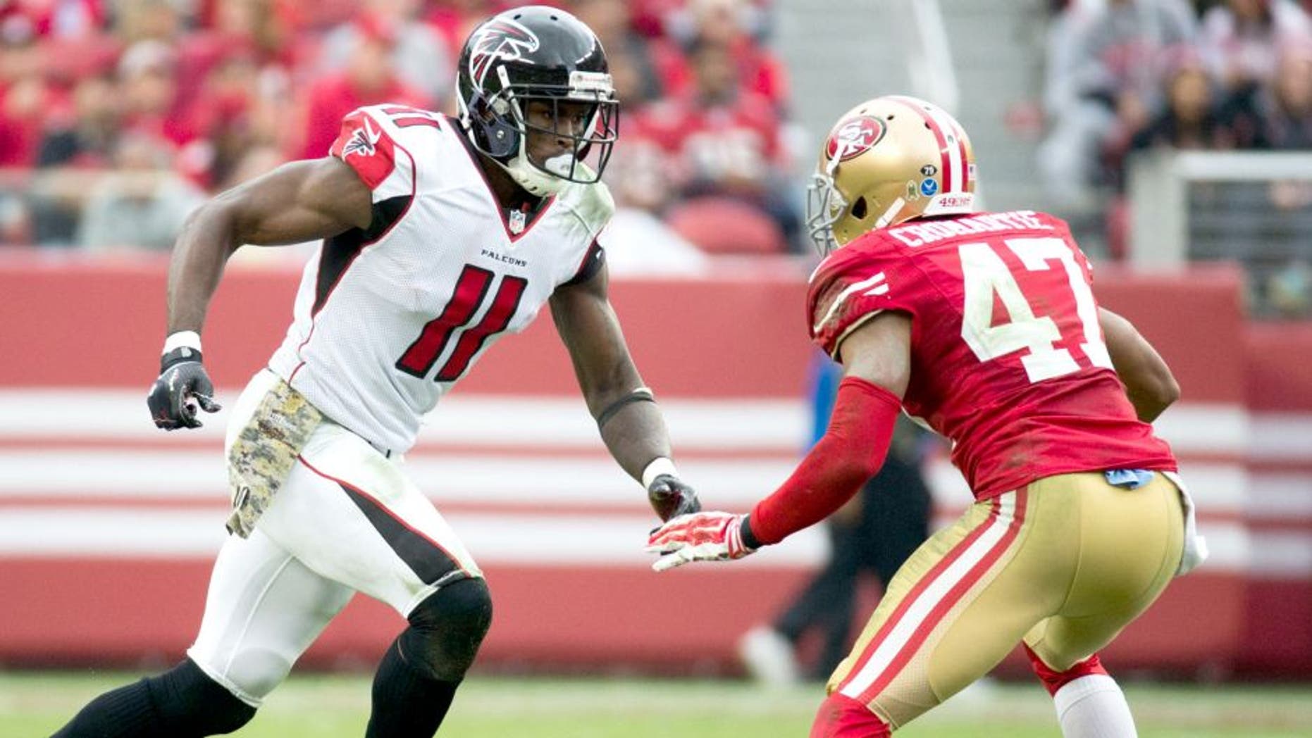 November 8, 2015; Santa Clara, CA, USA; Atlanta Falcons wide receiver Julio Jones (11) runs against San Francisco 49ers cornerback Marcus Cromartie (47) during the third quarter at Levi's Stadium. The 49ers defeated the Falcons 17-16. Mandatory Credit: Kyle Terada-USA TODAY Sports