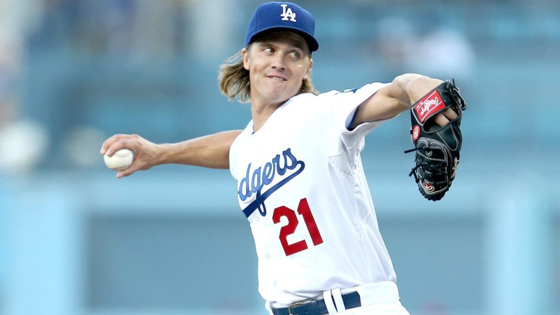 LOS ANGELES, CA - JULY 31: Zack Greinke #21 of the Los Angeles Dodgers throws a pitch against the Los Angeles Angels of Anaheim at Dodger Stadium on July 31, 2015 in Los Angeles, California. (Photo by Stephen Dunn/Getty Images)