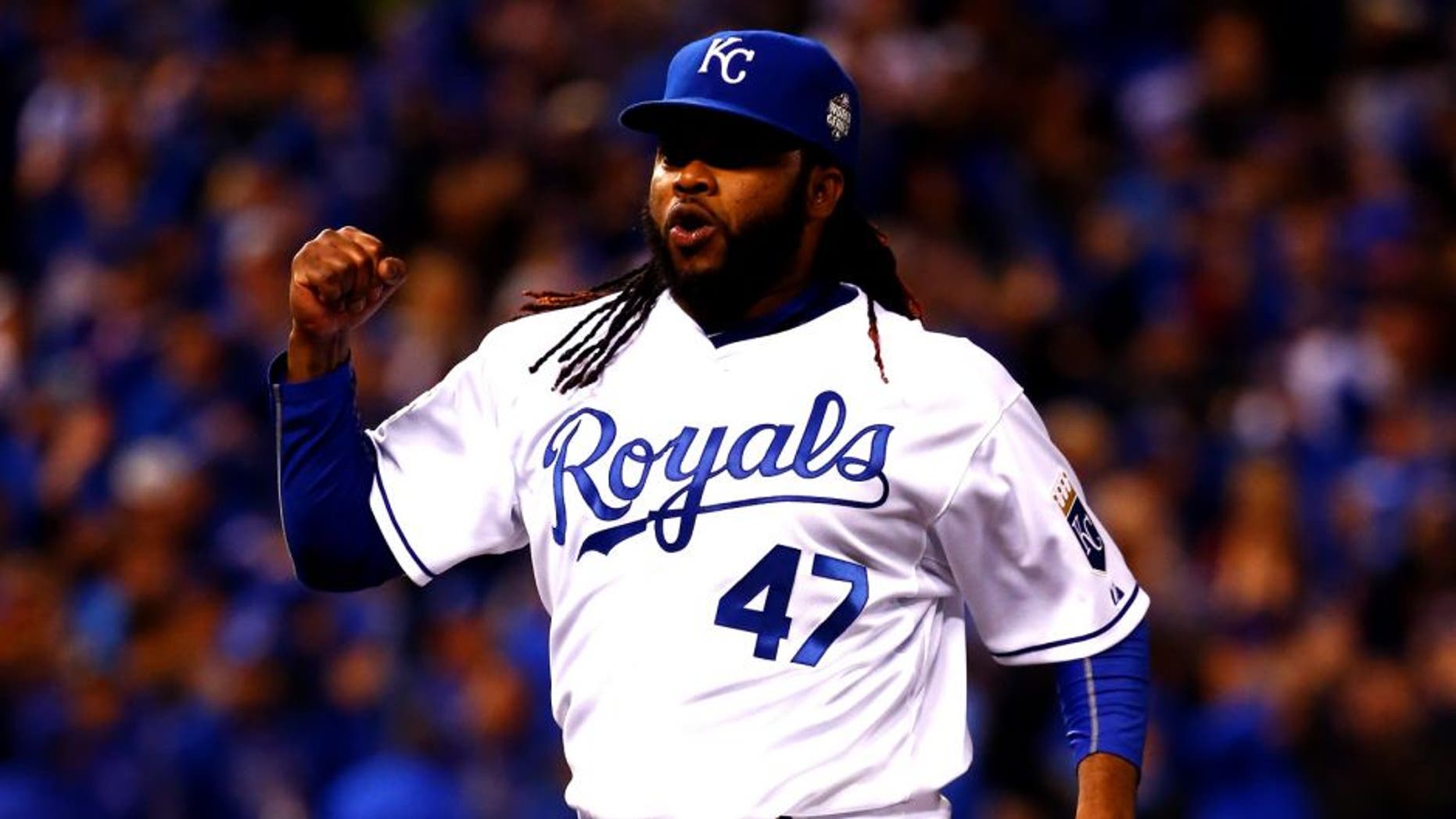 KANSAS CITY, MO - OCTOBER 28: Johnny Cueto #47 celebrates after Alcides Escobar #2 of the Kansas City Royals fields a ground ball hit by Juan Lagares #12 of the New York Mets (not pictured) in the eighth inning in Game Two of the 2015 World Series between the Kansas City Royals and the New York Mets at Kauffman Stadium on October 28, 2015 in Kansas City, Missouri. (Photo by Jamie Squire/Getty Images)