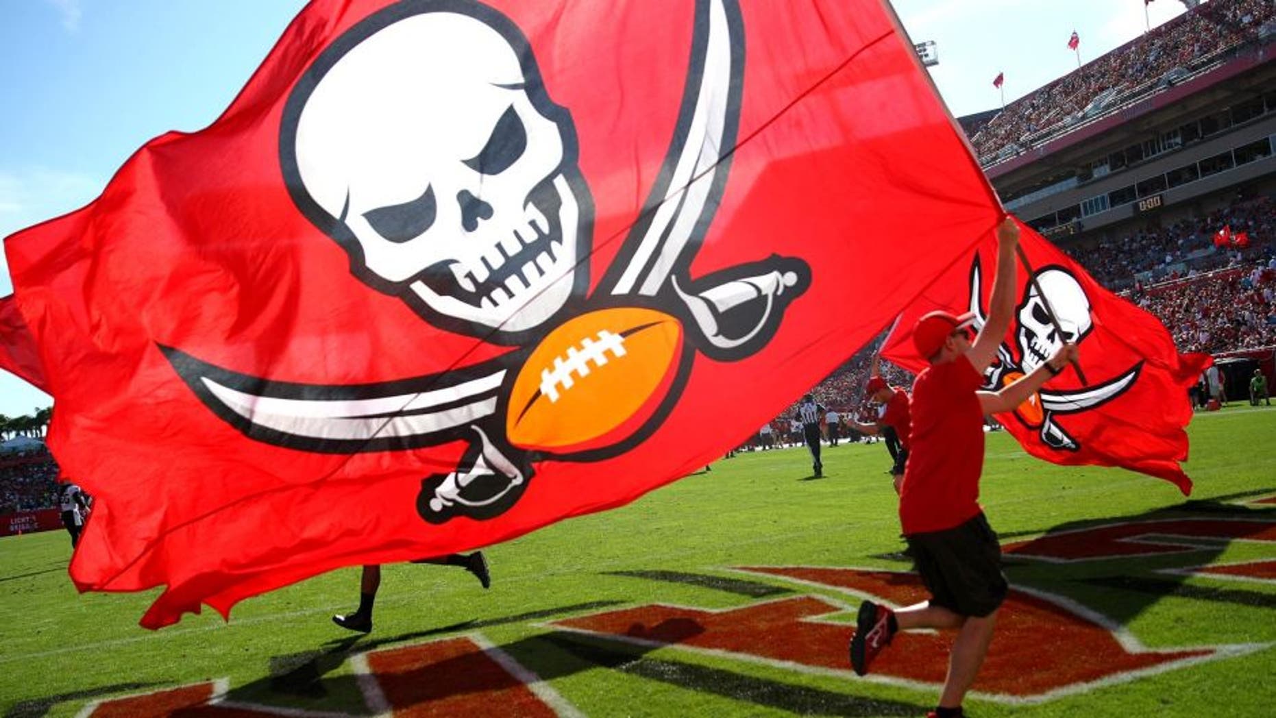 TAMPA, FL - DECEMBER 28: A Buccaneer pirate flag is flown after a touchdown score during an NFL football game between the New Orleans Saints and the Tampa Bay Buccaneers at Raymond James Stadium on December 28, 2014 in Tampa, Florida. (Photo by Alex Menendez/Getty Images)