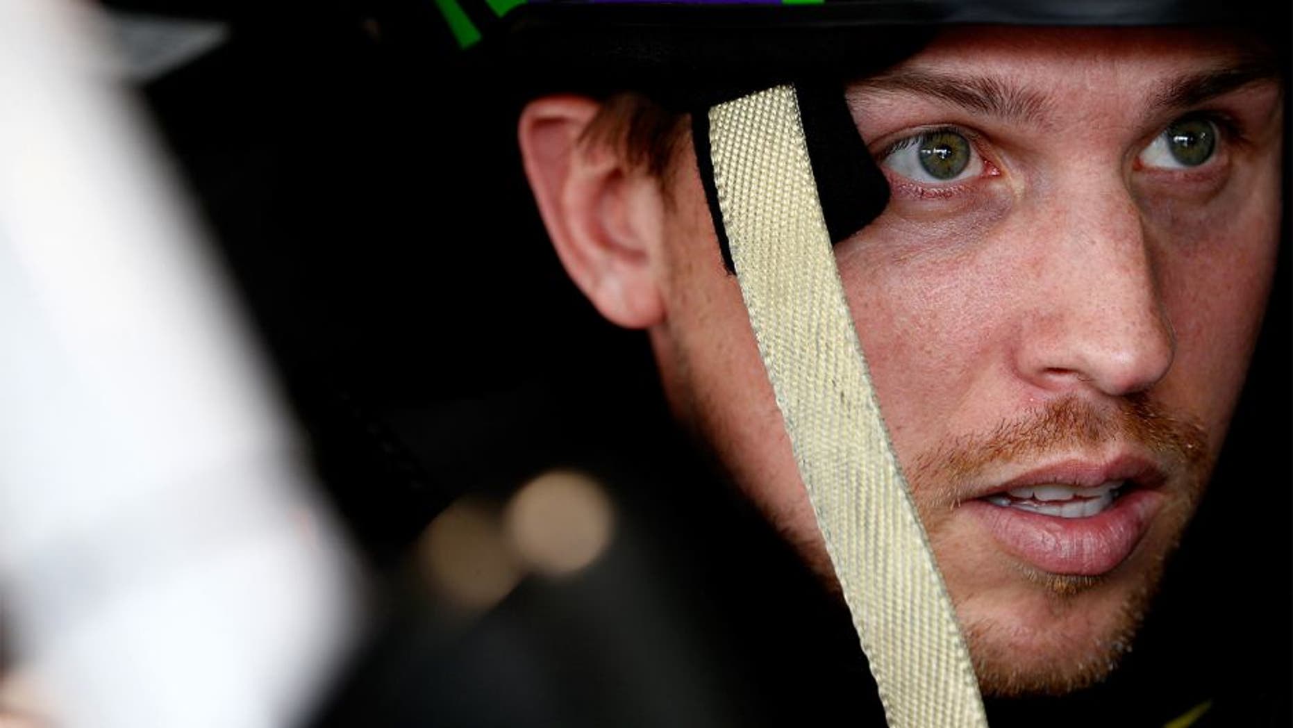 MARTINSVILLE, VA - OCTOBER 31: Denny Hamlin, driver of the #11 FedEx Ground Toyota, sits in his car during practice for the NASCAR Sprint Cup Series Goody's Headache Relief Shot 500 at Martinsville Speedway on October 31, 2015 in Martinsville, Virginia. (Photo by Jeff Zelevansky/Getty Images)