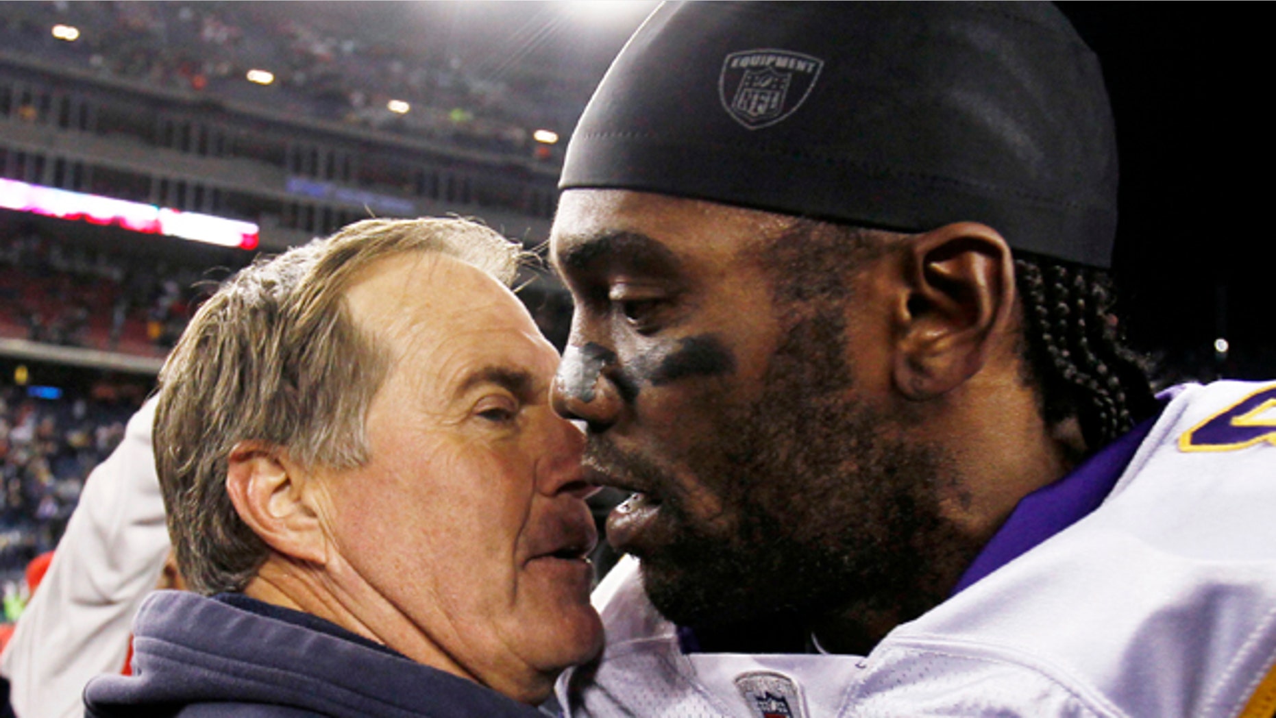 Oct. 31: New England Patriots coach Bill Belichick hugs Minnesota Vikings wide receiver Randy Moss after New England's 28-18 win in an NFL football game in Foxborough, Mass.