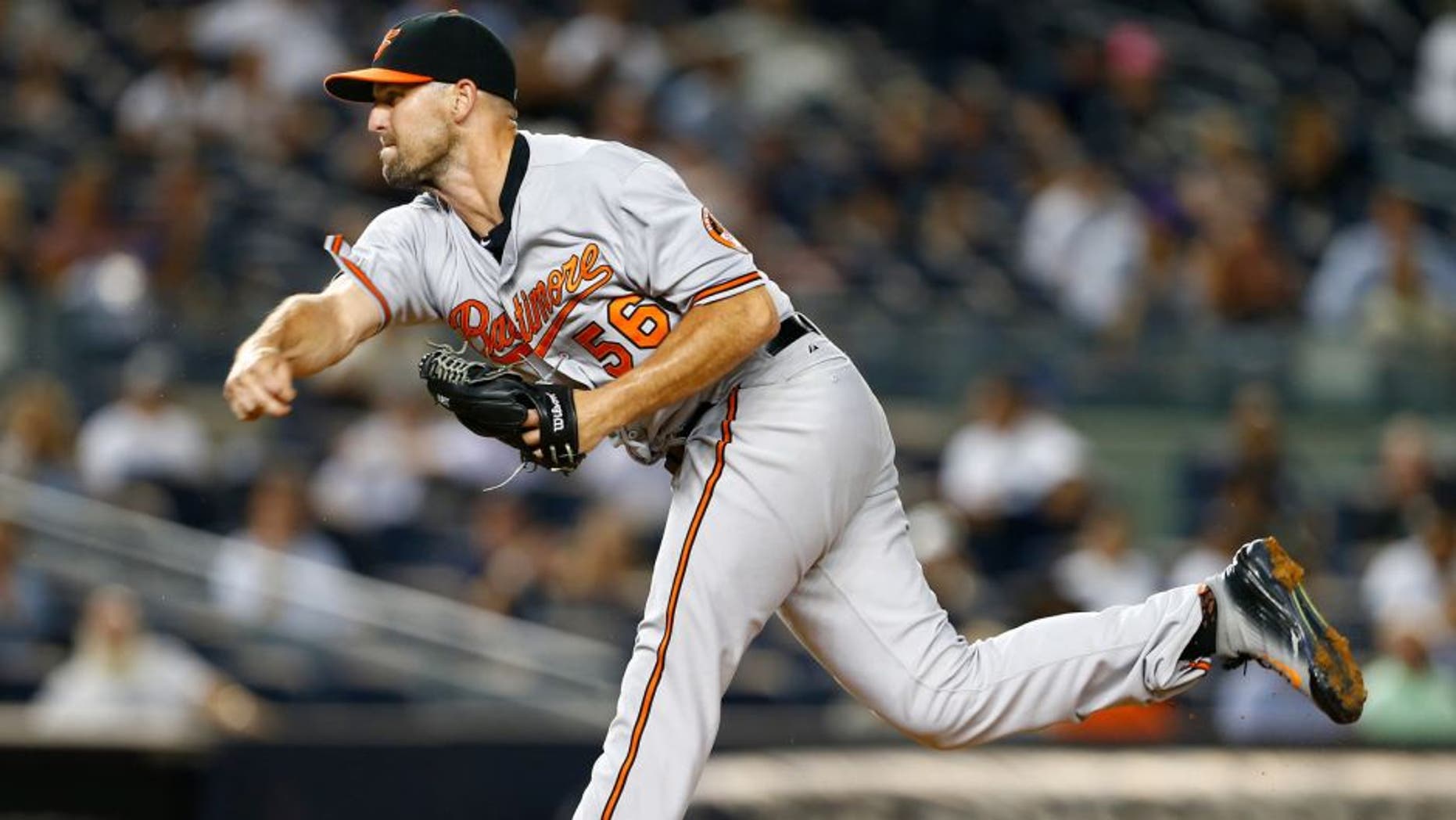 NEW YORK, NY - SEPTEMBER 09: Darren O'Day #56 of the Baltimore Orioles in action against the New York Yankees at Yankee Stadium on September 9, 2015 in the Bronx borough of New York City. (Photo by Rich Schultz/Getty Images)