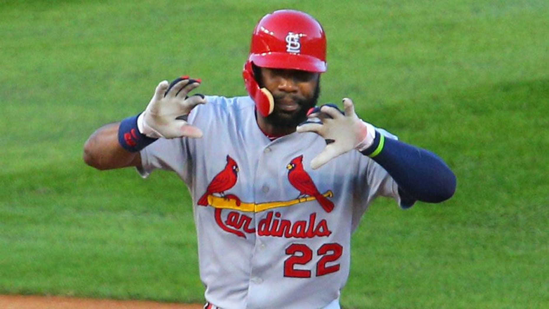 Oct 12, 2015; Chicago, IL, USA; St. Louis Cardinals right fielder Jason Heyward (22) celebrates after hitting a double during the second inning in game three of the NLDS against the Chicago Cubs at Wrigley Field. Mandatory Credit: Dennis Wierzbicki-USA TODAY Sports