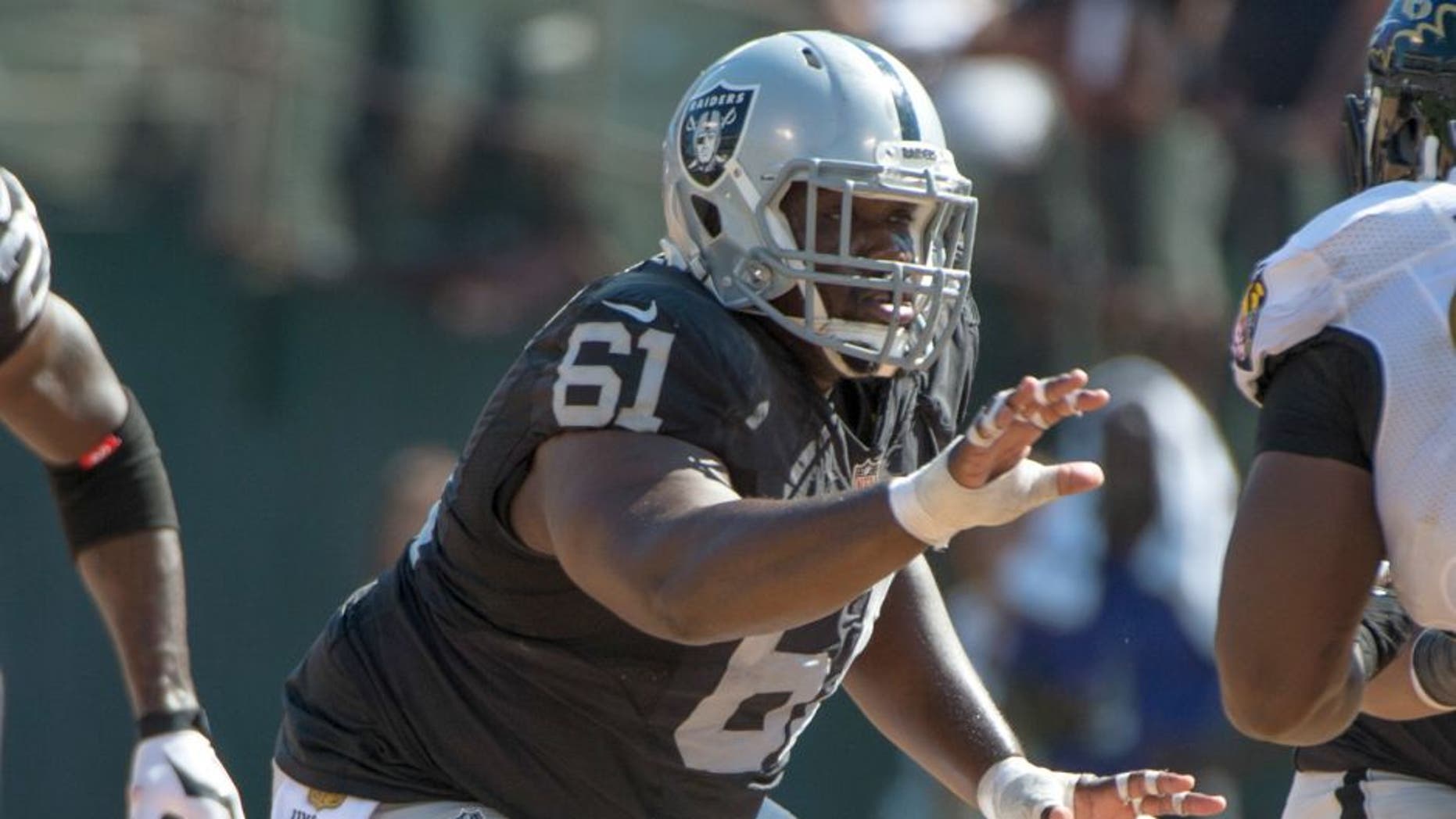September 20, 2015; Oakland, CA, USA; Oakland Raiders center Rodney Hudson (61) during the third quarter against the Baltimore Ravens at O.co Coliseum. The Raiders defeated the Ravens 37-33. Mandatory Credit: Kyle Terada-USA TODAY Sports