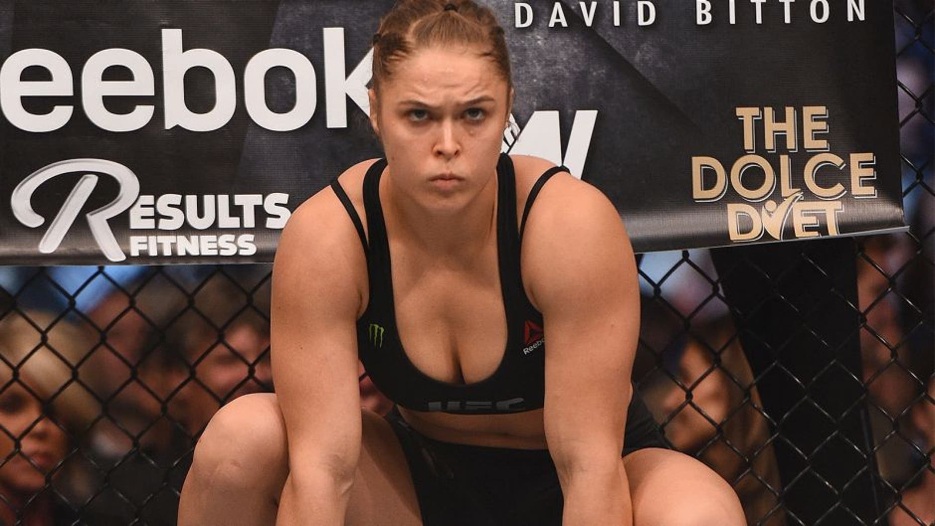 LOS ANGELES, CA - FEBRUARY 28: Ronda Rousey enters the Octagon in her UFC women's bantamweight championship bout against Cat Zingano during the UFC 184 event at Staples Center on February 28, 2015 in Los Angeles, California. (Photo by Jeff Bottari/Zuffa LLC/Zuffa LLC via Getty Images)