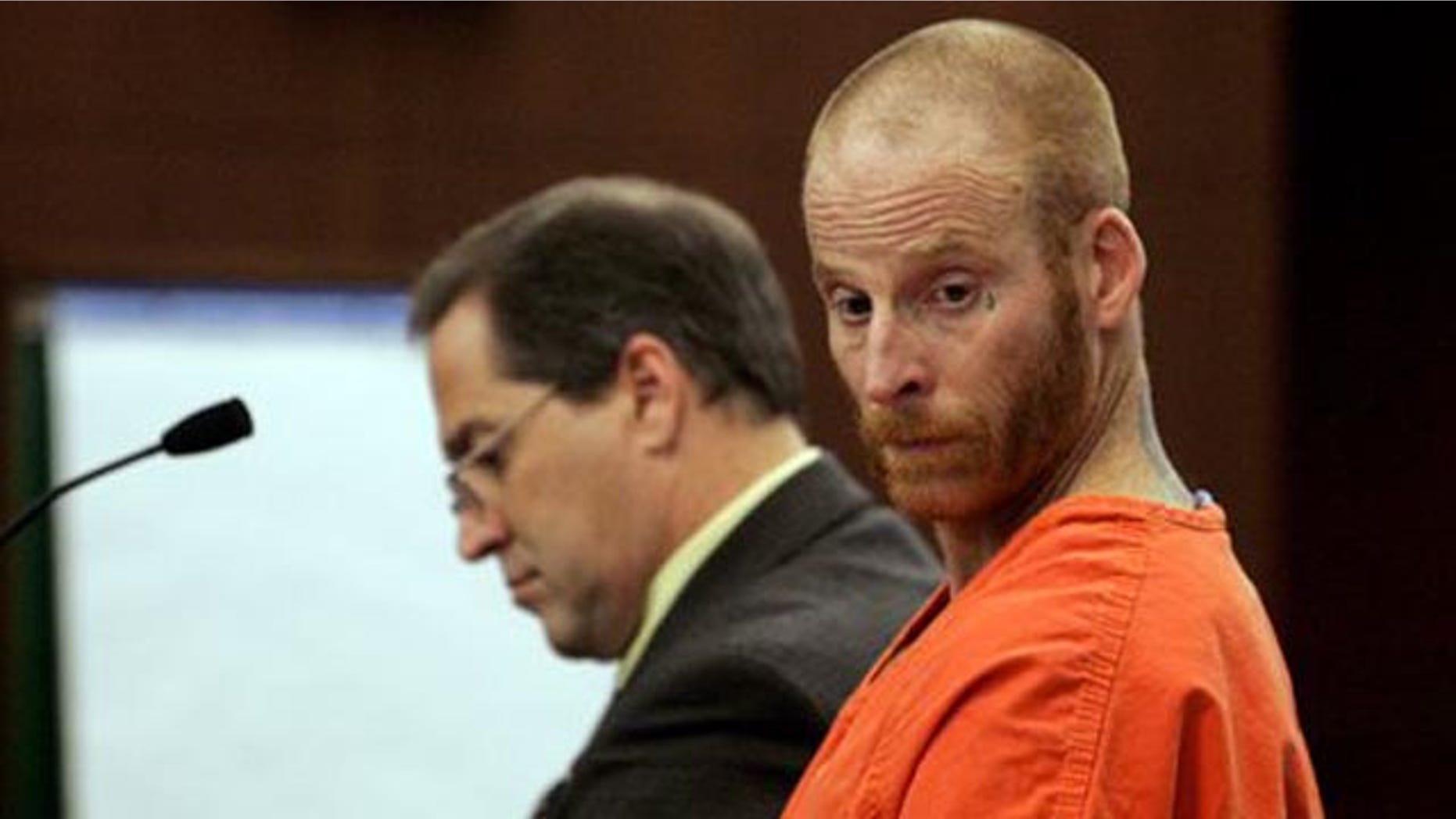 October 25, 2011: Eric Millerberg stands next to his public defender Randall Marshall during his sentencing for a drug violation at the 2nd District Court in Ogden, Utah.