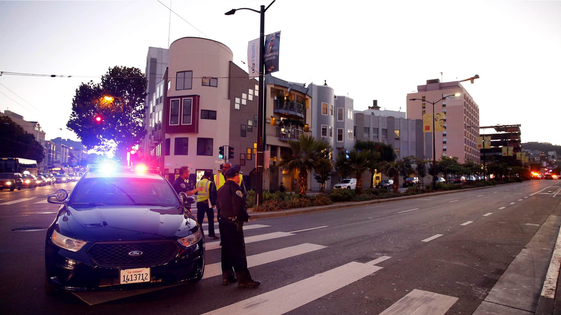 Nov. 11, 2015: Police block off Cesar Chavez near St. Luke's hospital where a shooting occurred in San Francisco.