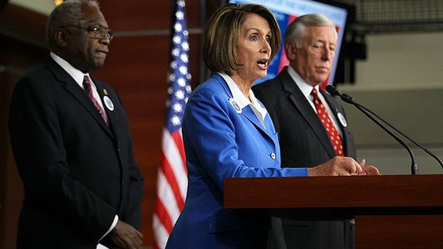 Sept. 30: Speaker of the House Rep. Nancy Pelosi (D-CA) speaks as House Majority Leader Rep. Steny Hoyer (D-MD) (R), and House Majority Whip James Clyburn (D-SC) (L) listen during a news conference on Capitol Hill.