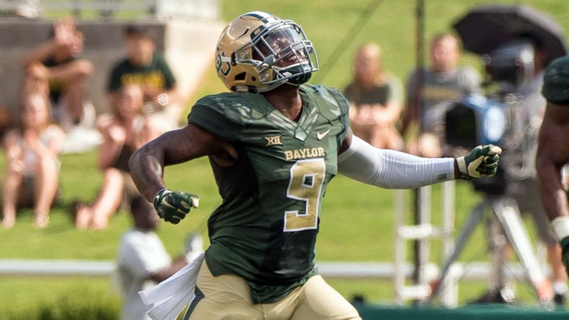 Sep 26, 2015; Waco, TX, USA; Baylor Bears cornerback Ryan Reid (9) celebrates blocking a field goal attempt by the Rice Owls during the second quarter at McLane Stadium. Mandatory Credit: Jerome Miron-USA TODAY Sports