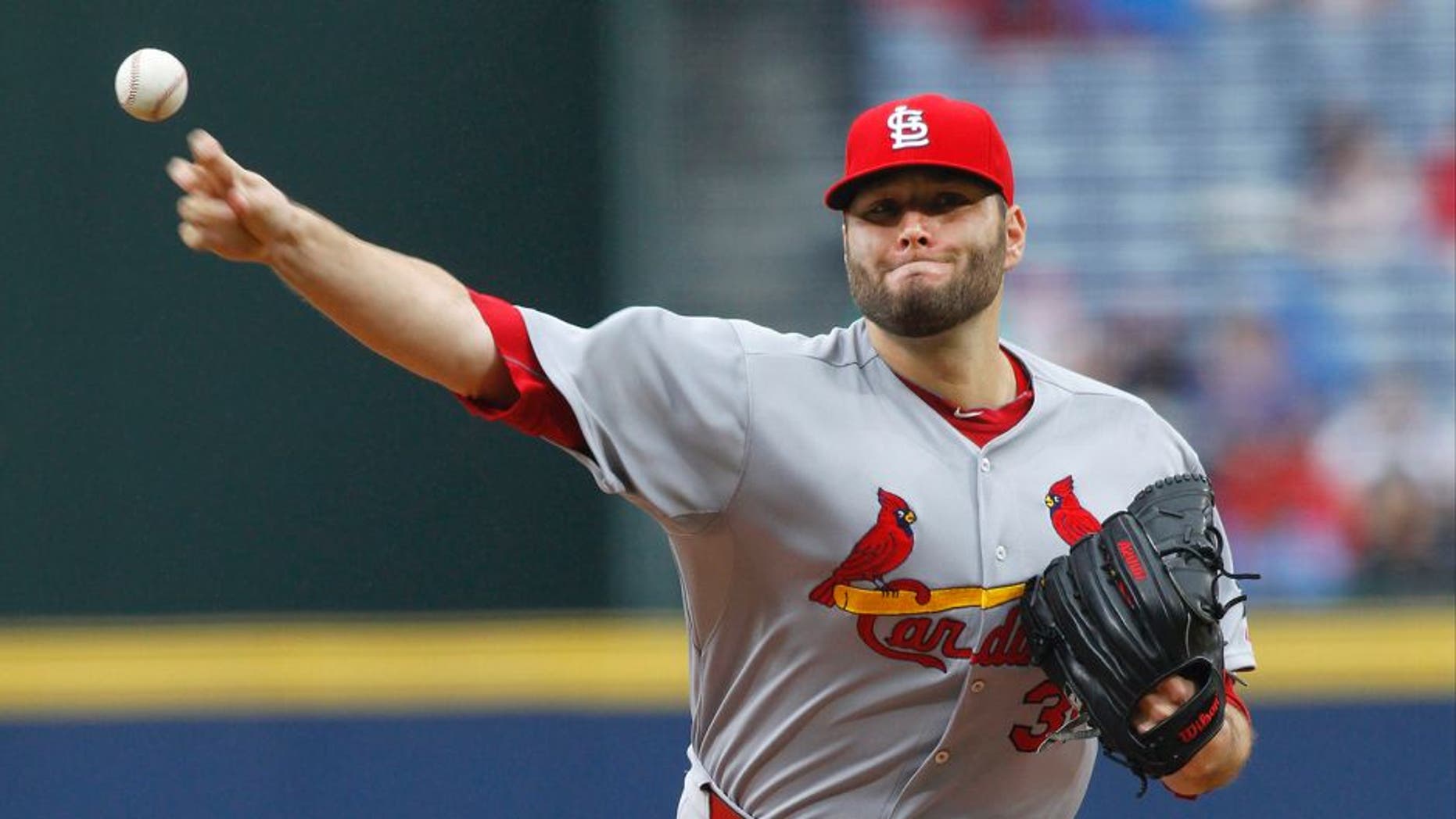 Oct 4, 2015; Atlanta, GA, USA; St. Louis Cardinals starting pitcher Lance Lynn (31) throws a pitch against the Atlanta Braves in the first inning at Turner Field. Mandatory Credit: Brett Davis-USA TODAY Sports