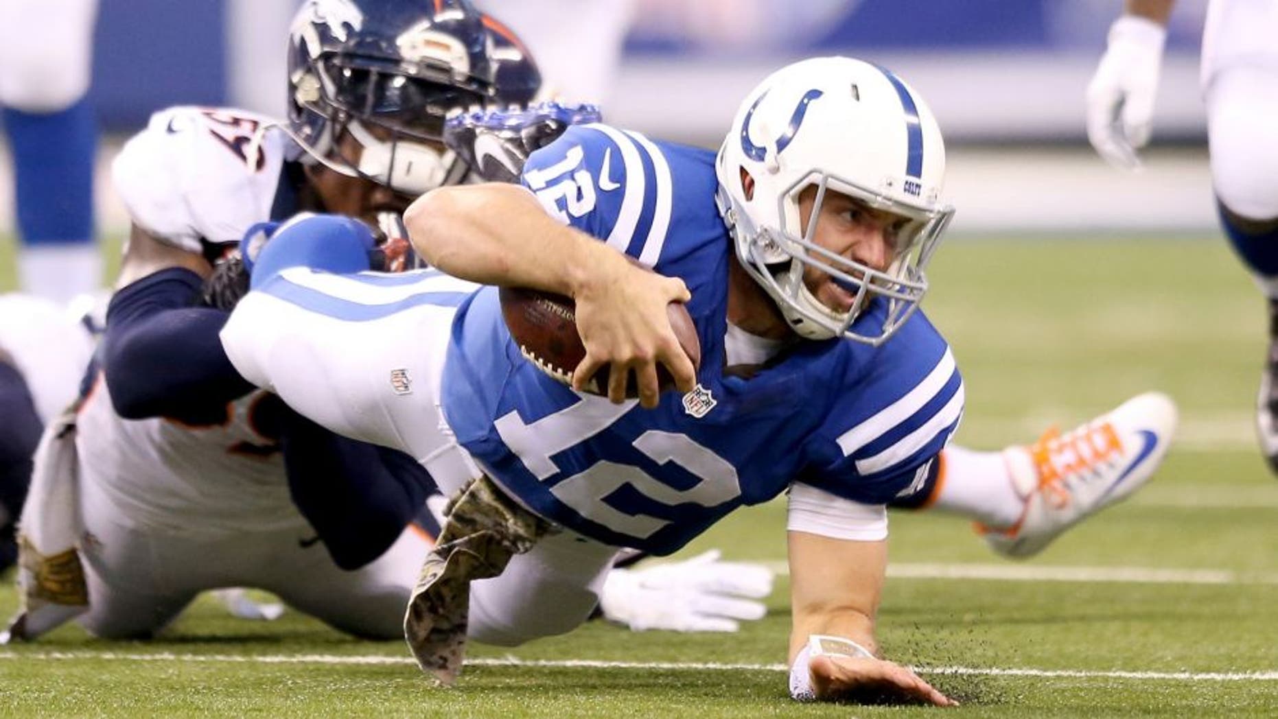 INDIANAPOLIS, IN - NOVEMBER 08: Andrew Luck #12 of the Indianapolis Colts runs with the ball during the game against the Denver Broncos at Lucas Oil Stadium on November 8, 2015 in Indianapolis, Indiana. (Photo by Andy Lyons/Getty Images)
