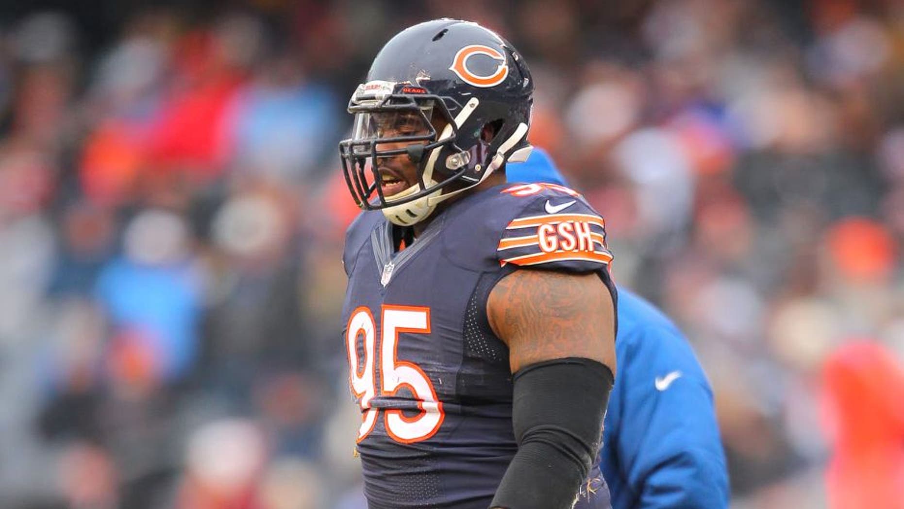 Dec 21, 2014; Chicago, IL, USA; Chicago Bears defensive tackle Ego Ferguson (95) walks off the field after an injury during the second half against the Detroit Lions at Soldier Field. Detroit won 20-14. Mandatory Credit: Dennis Wierzbicki-USA TODAY Sports