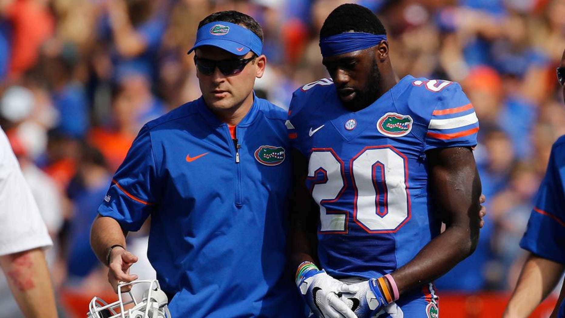 Nov 12, 2016; Gainesville, FL, USA; Florida Gators defensive back Marcus Maye (20) leaves the game with an apparent injury against the South Carolina Gamecocks during the first quarter at Ben Hill Griffin Stadium. Mandatory Credit: Kim Klement-USA TODAY Sports